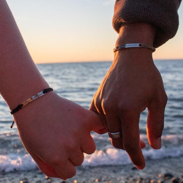 One of our favorite pics together! A pinky promise to be together forever while wearing our matching bracelets that say, "Stronger with you."
