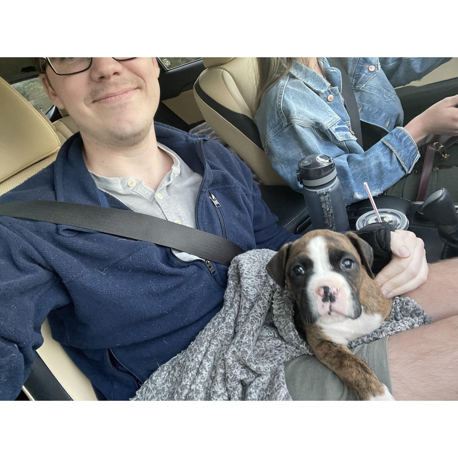October 2021: Moments after picking up our sweet Hilde from Toccoa, GA. Andrew and I bonded over our love for boxers on the night we met,  so this felt fated.