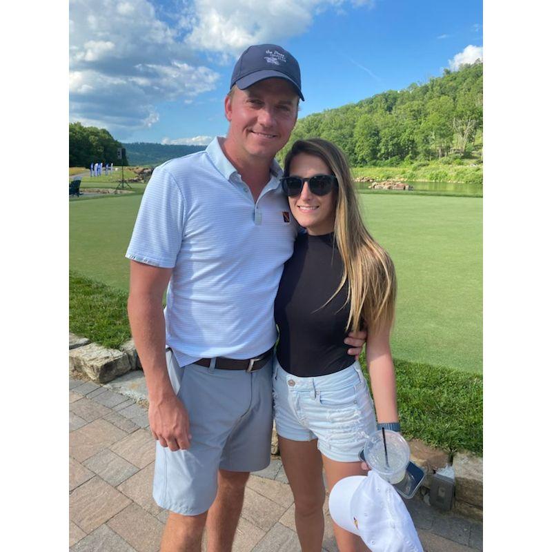 Scott played a lot of golf tournaments in 2021, and Jess walked the course every time. Phew.
