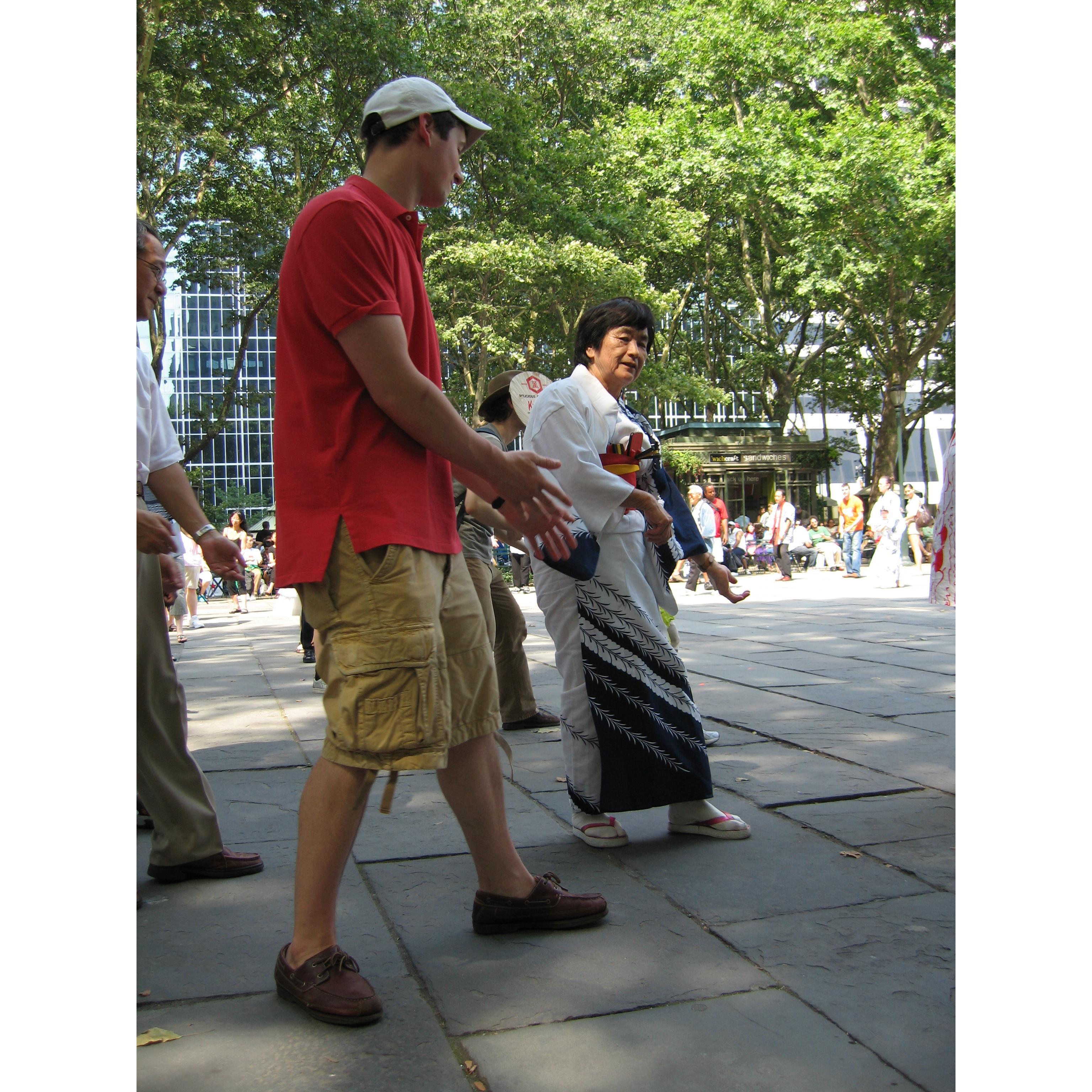 Tom's dance moves have always been a source of joy for Jung. Here he jumped in at a Japanese cultural festival at the park. (NYC 2007)