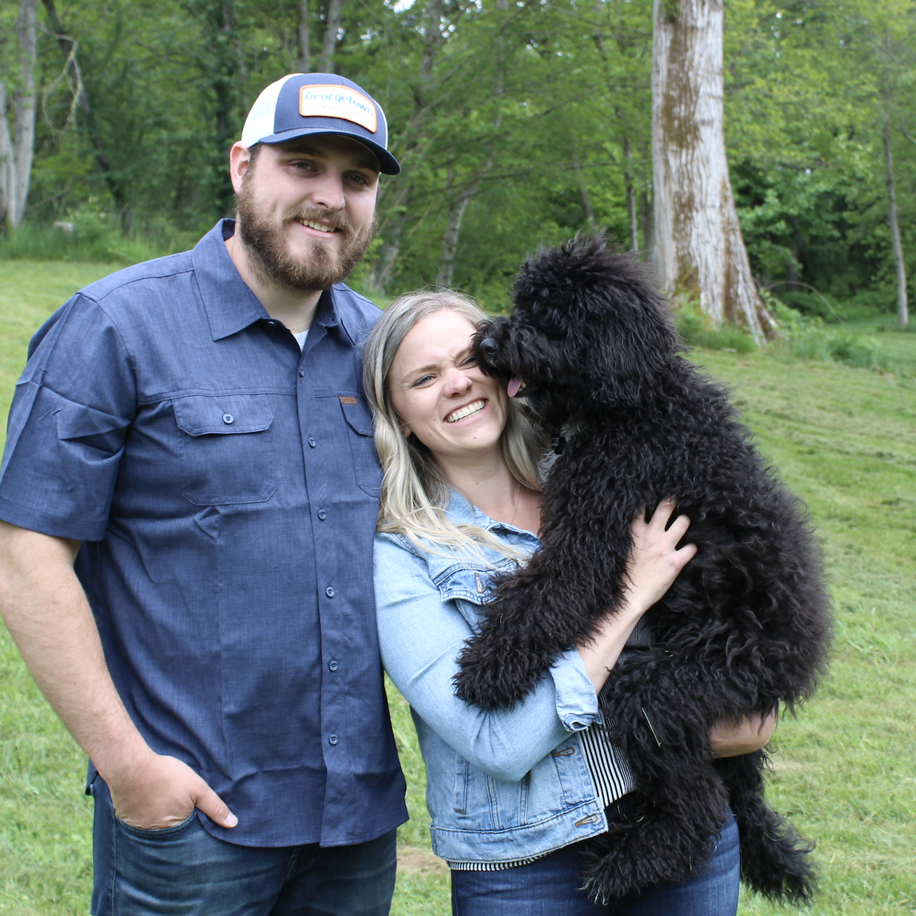 Us with our mini Goldendoodle, Leroy!