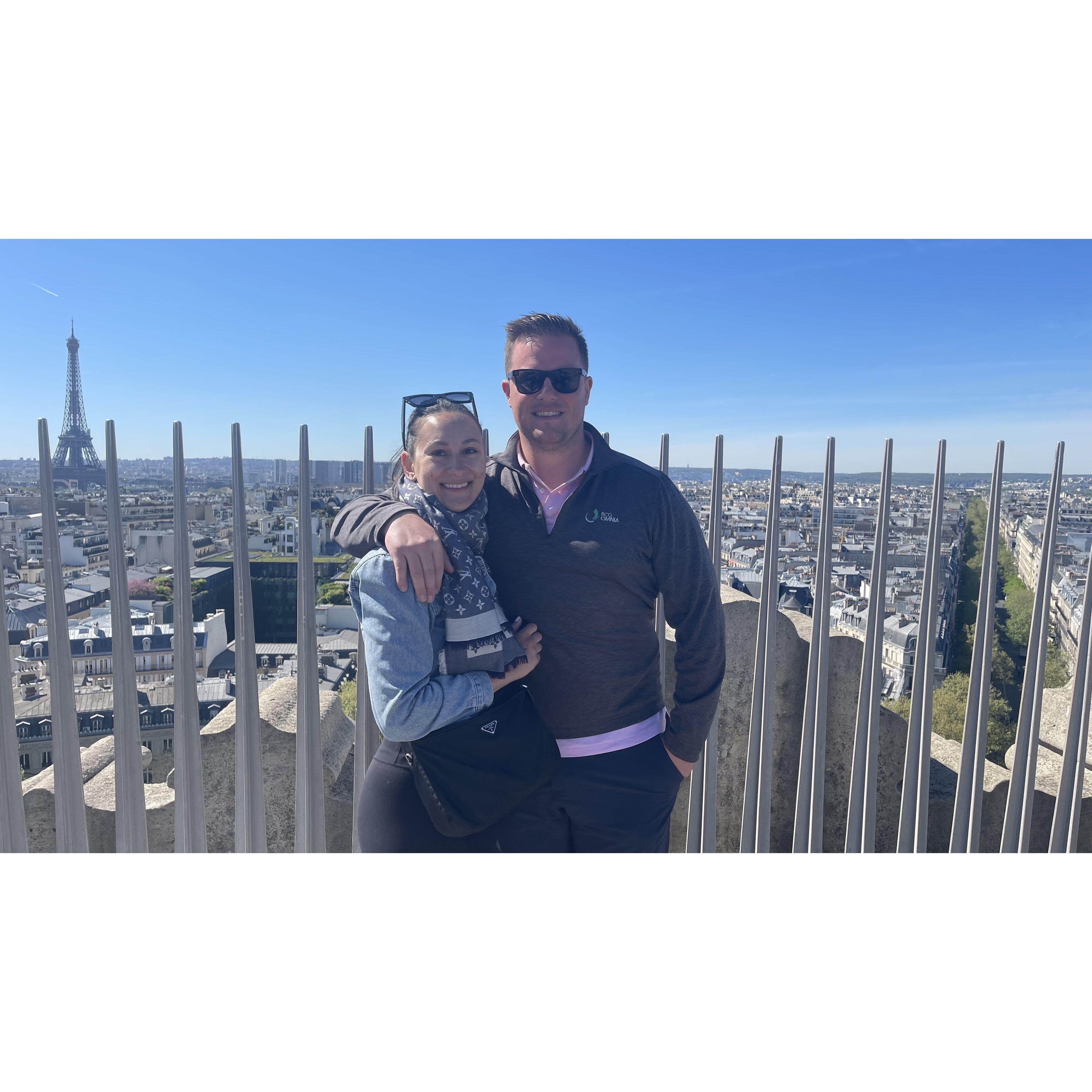 J'aime Paris.  Atop the Arc de Triomphe with the Eiffel Tower in the background.