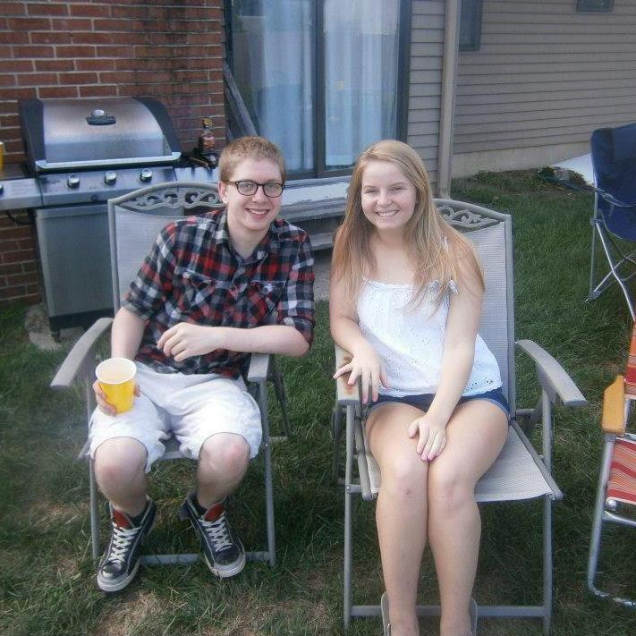 The first photo of us ever in existence! The first time Brett met Mel's family at her high school graduation party.