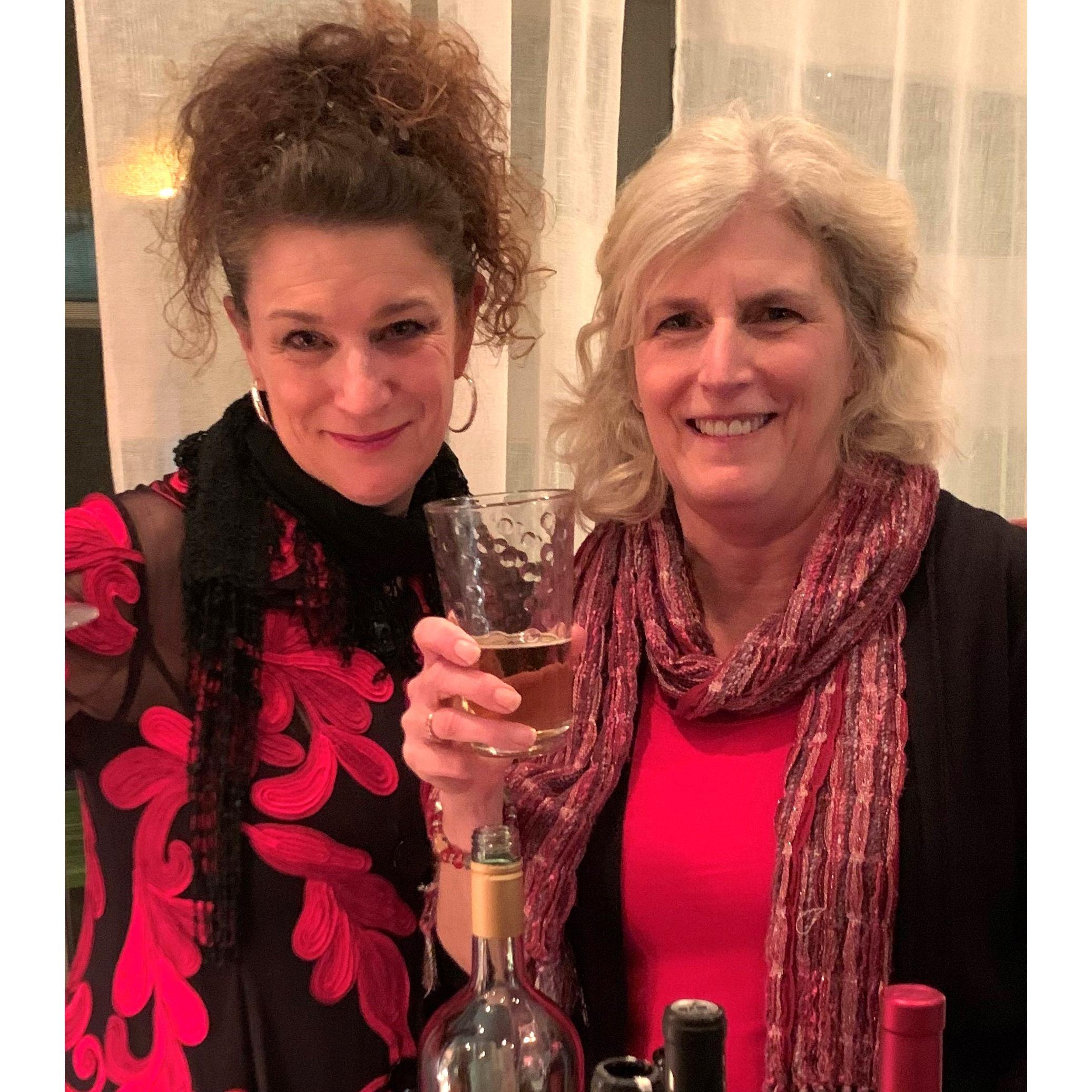 Marcia and Jordan (property & operations manager) toast to another year well done!