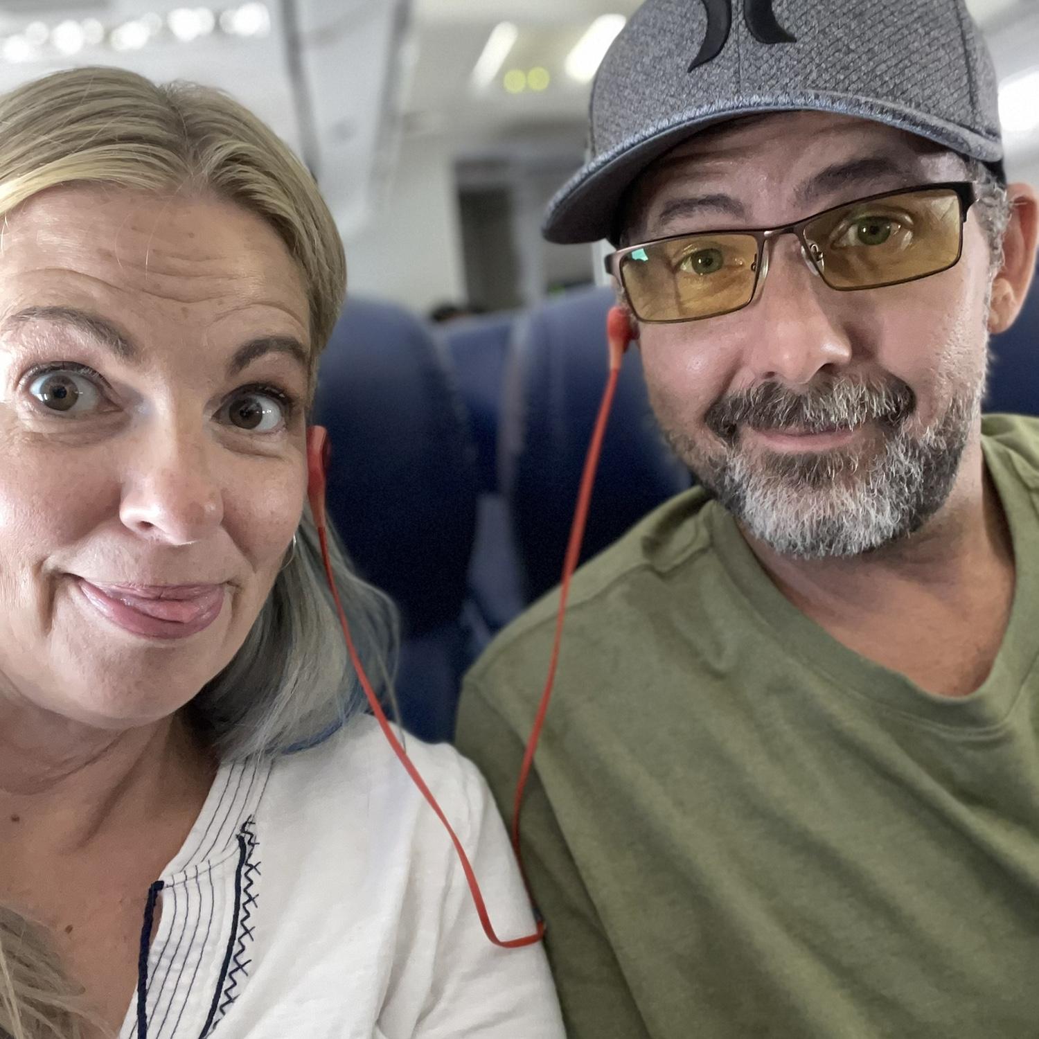 Gotta a long flight, might as well take a silly selfie.