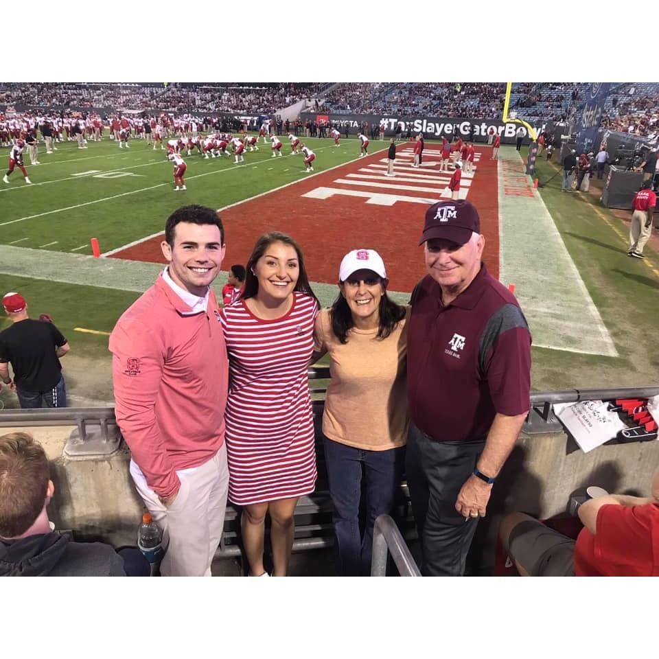 Jackson, Jessica, and Jess' Parents Barb & Steve at NC State vs. Texas A&M in the Gator Bowl on NYE 2018