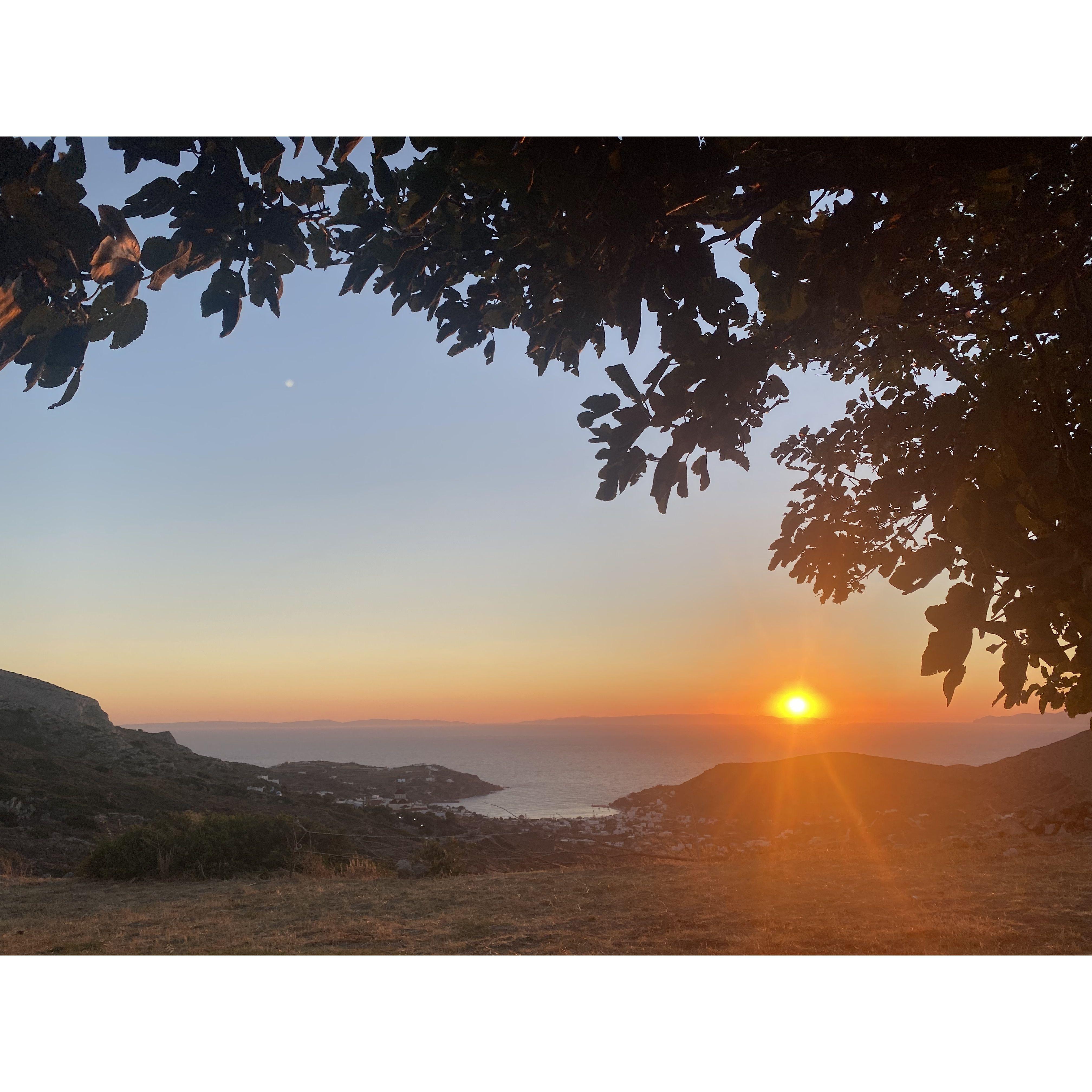 In 2022, we got engaged on top of a mountain in Syros, Greece at sunset.