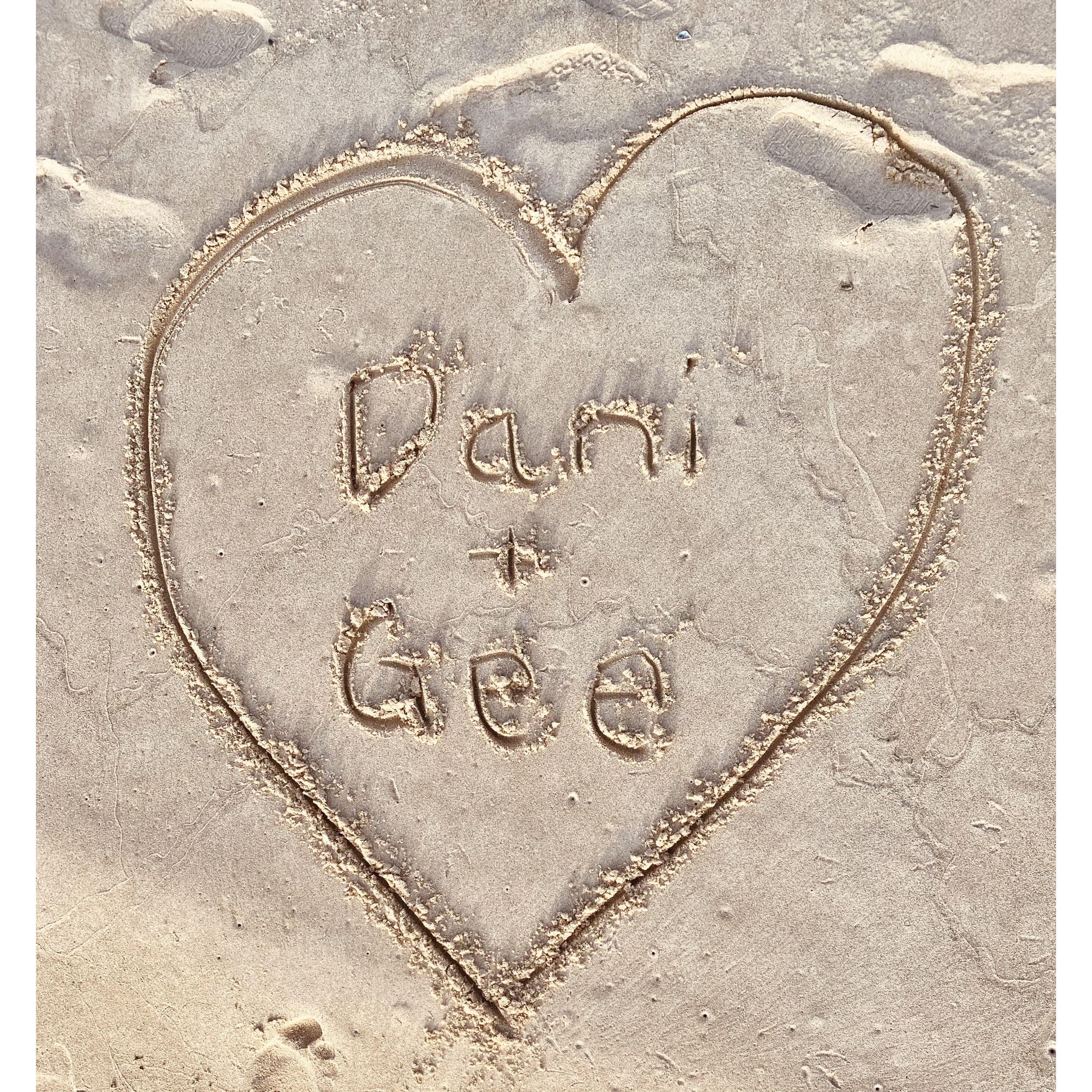 Gee, being the big romantic he is, wrote our names in the sand the first time that Danielle visited Lake Michigan in St. Joseph, MI.