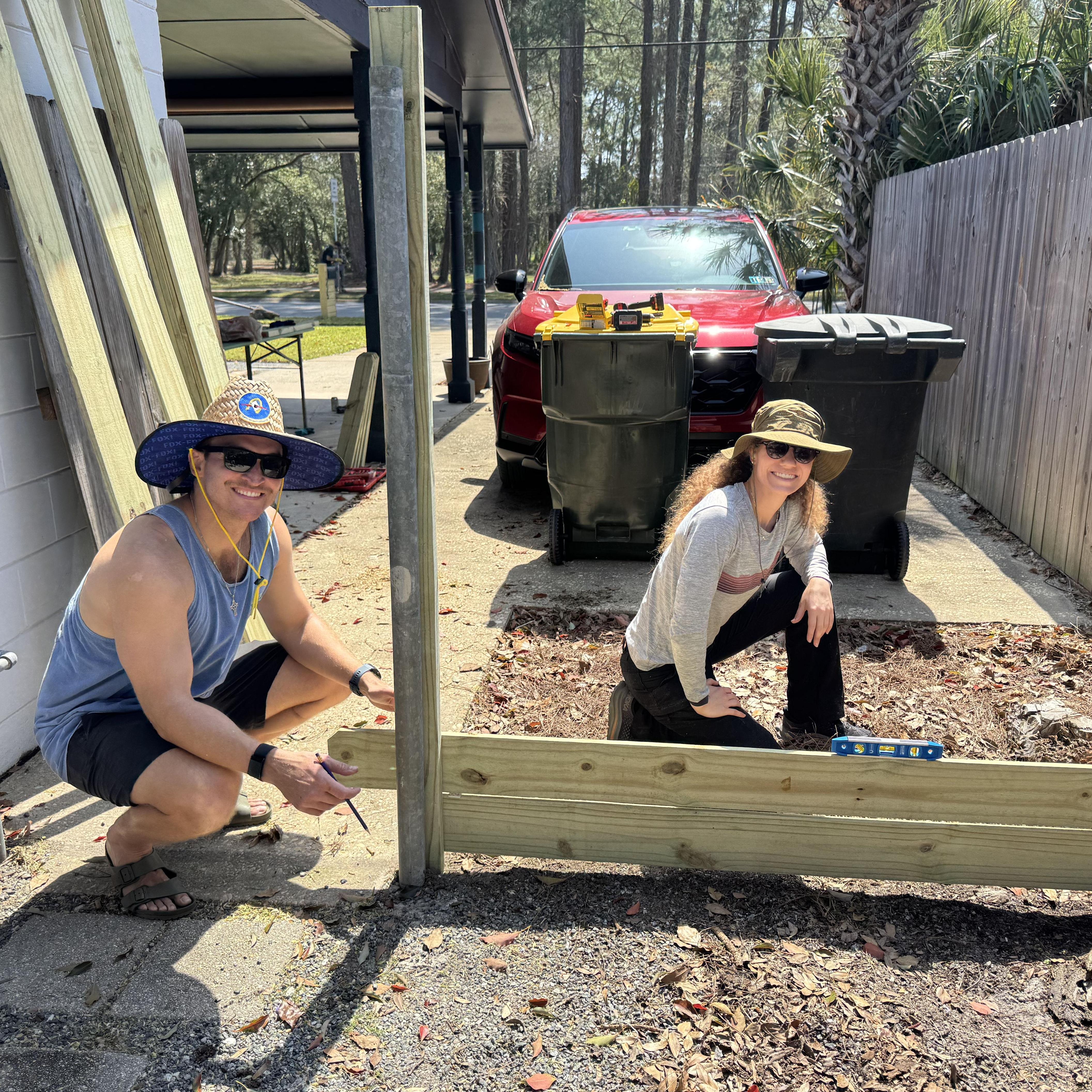 Testing our relationship while building a fence. Fort Walton Beach, FL, 2025