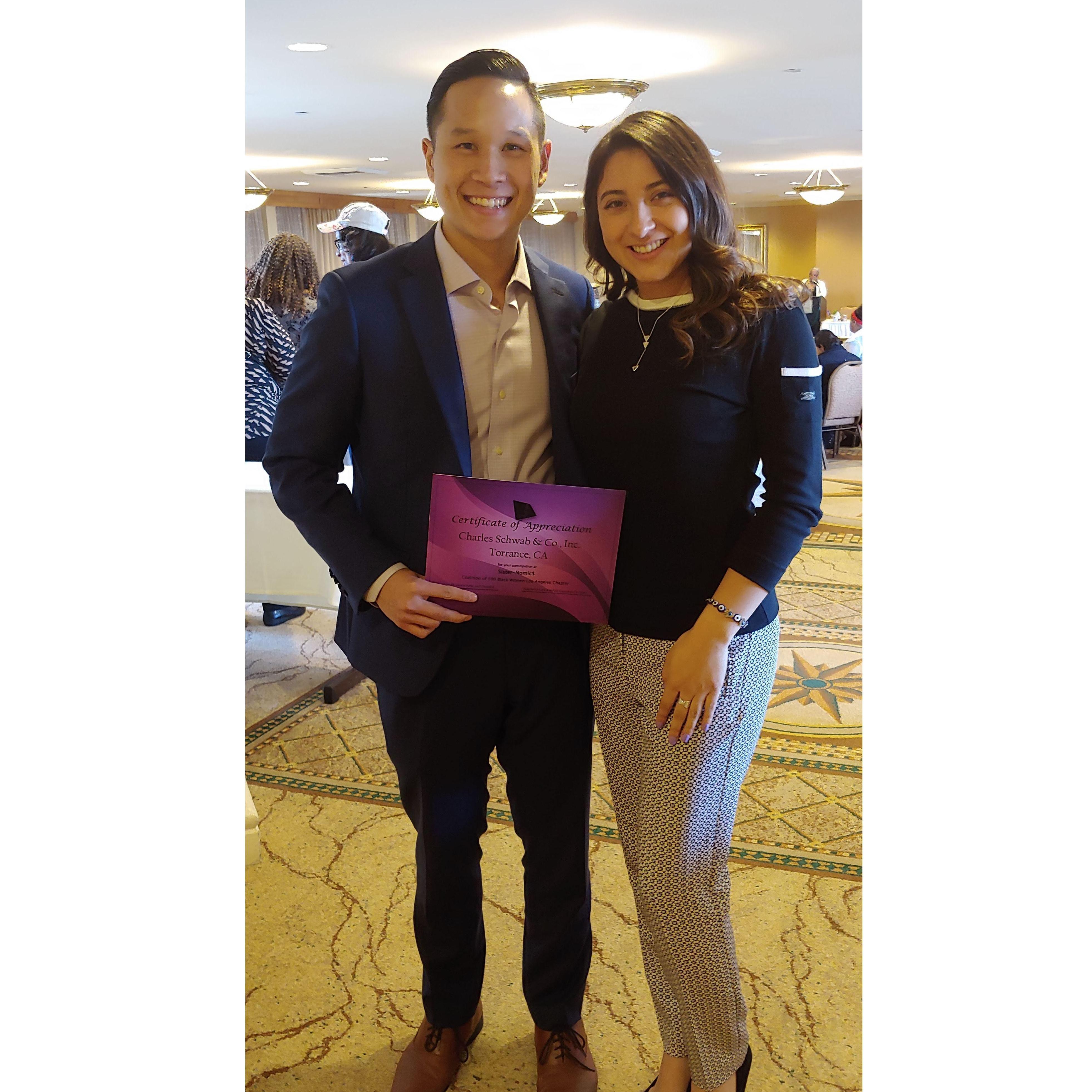 Nick receiving a Charles Schwab certificate - 2018