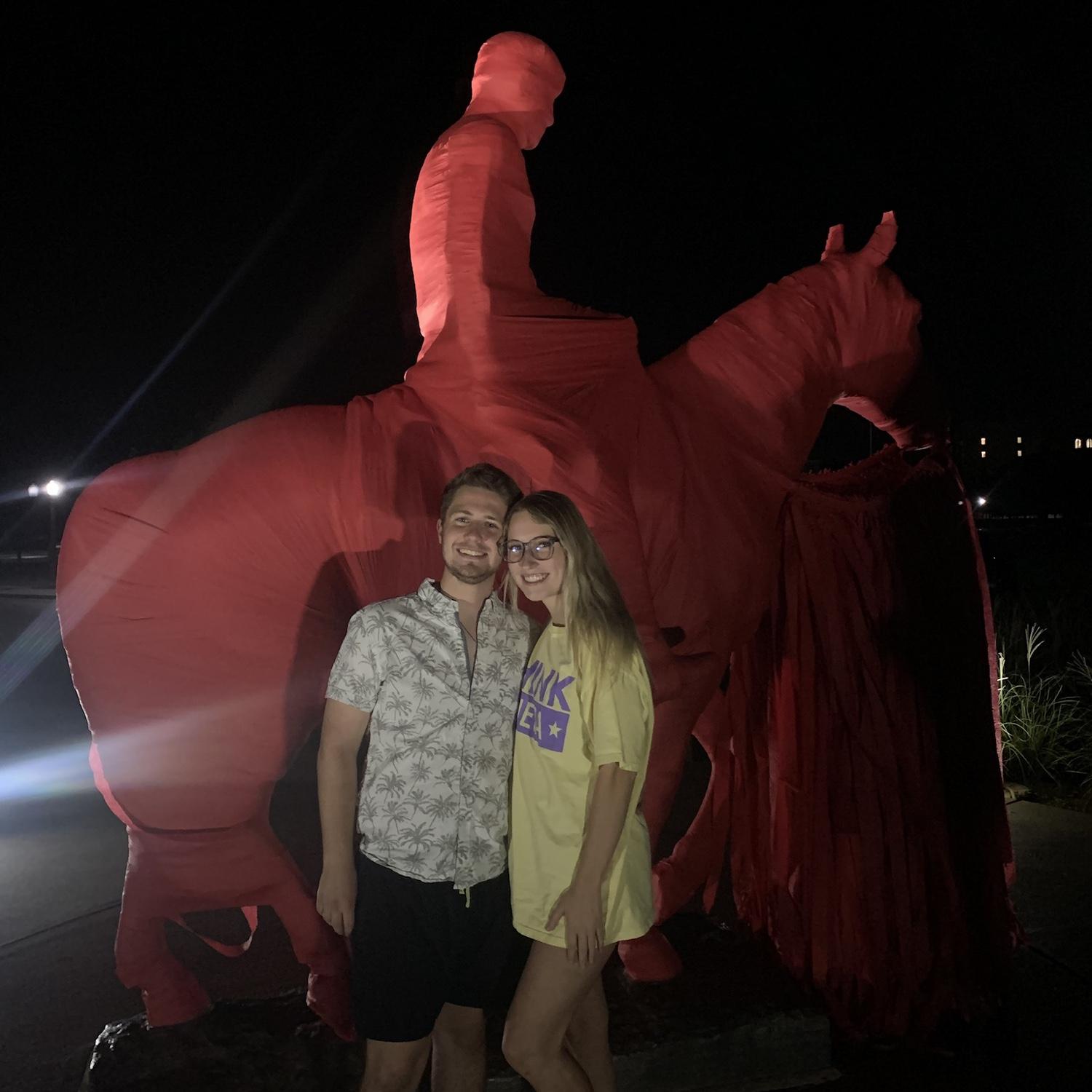 Christopher showing Kaitlin one of his favorite Texas Tech Traditions.
