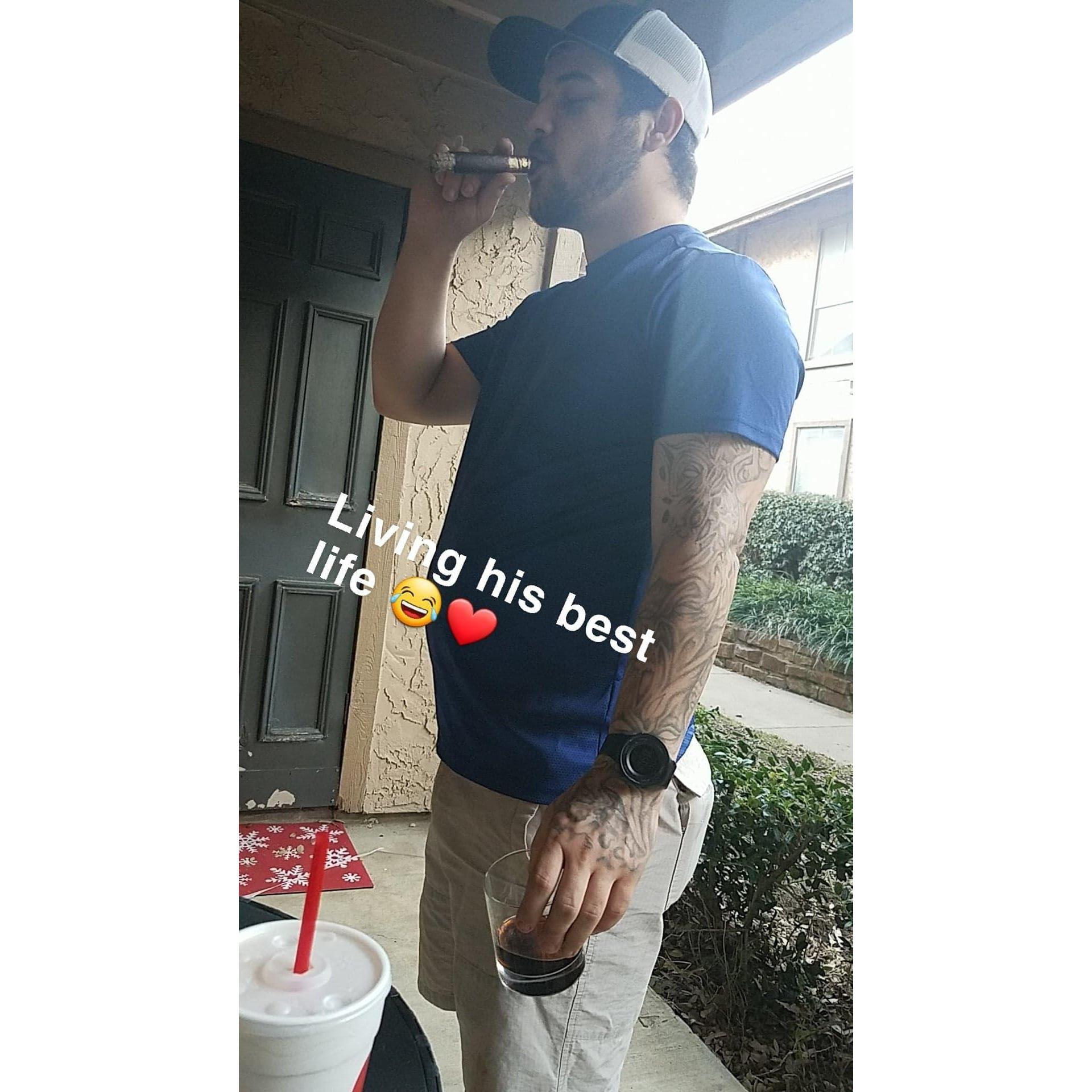 A drink + a cigar = happy Cameron