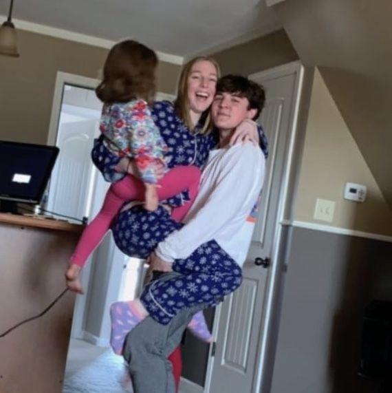 2018 was our first Christmas together. David told Sarah that his entire family wore Christmas pajamas for their family dinner. When Sarah showed up, she was the only one in pajamas!