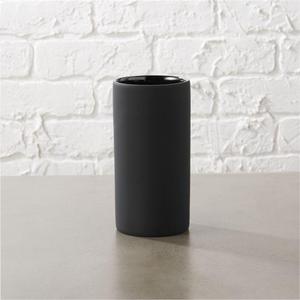 rubber coated black toothbrush-razor cup