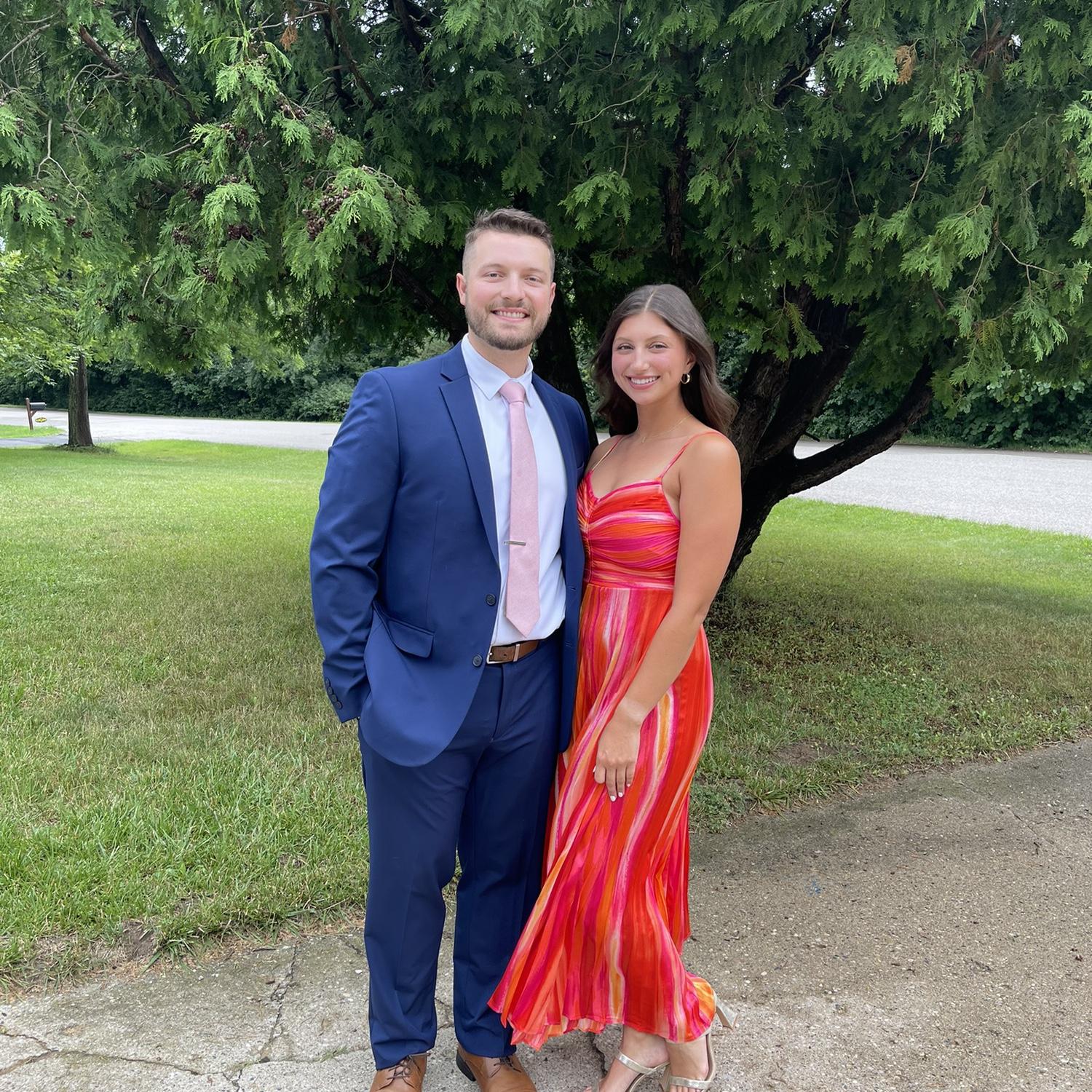 Long distance, but still made a trip up to MI possible during a weekend seeing each other! Our first wedding together.