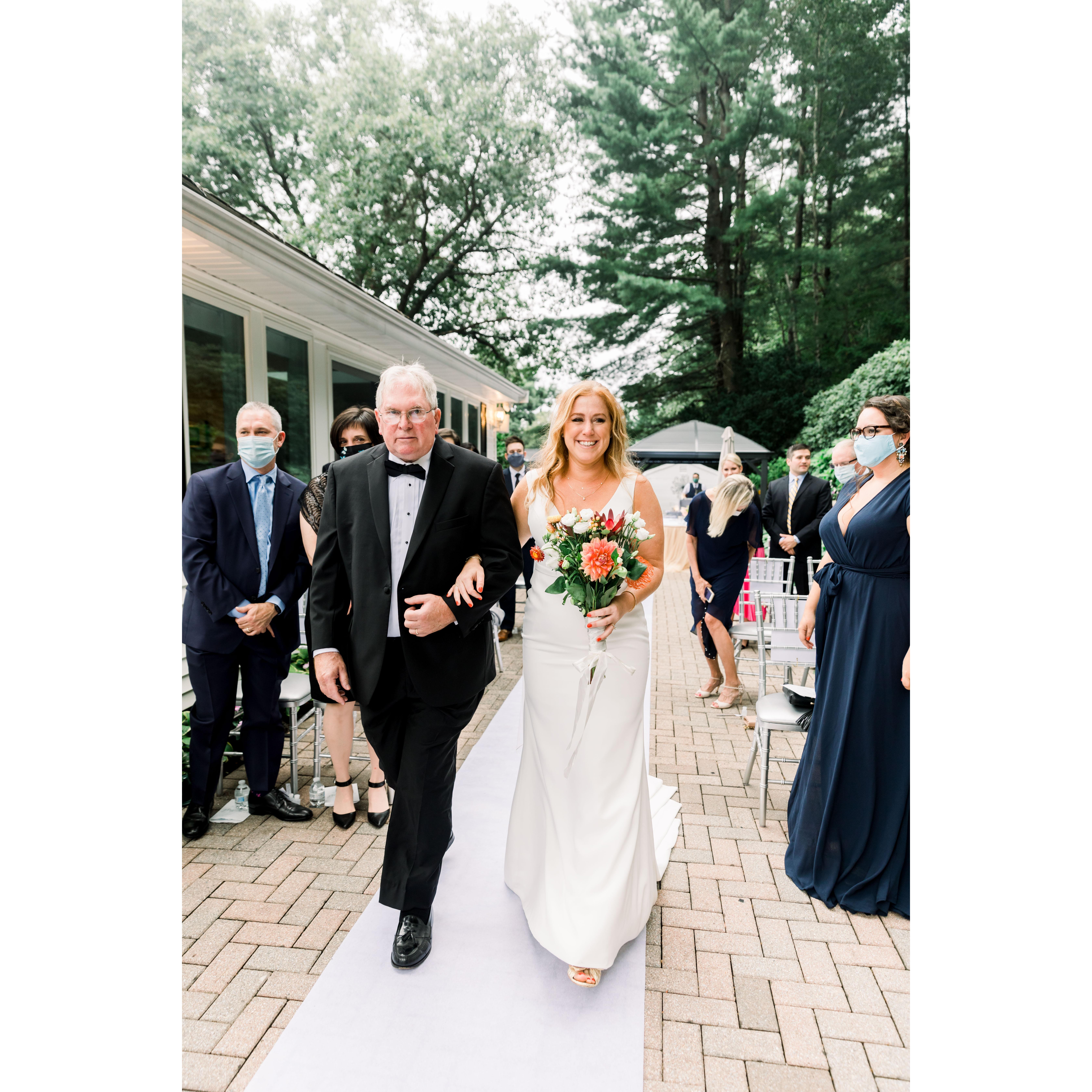 Dr. Campbell walking Katie down the aisle