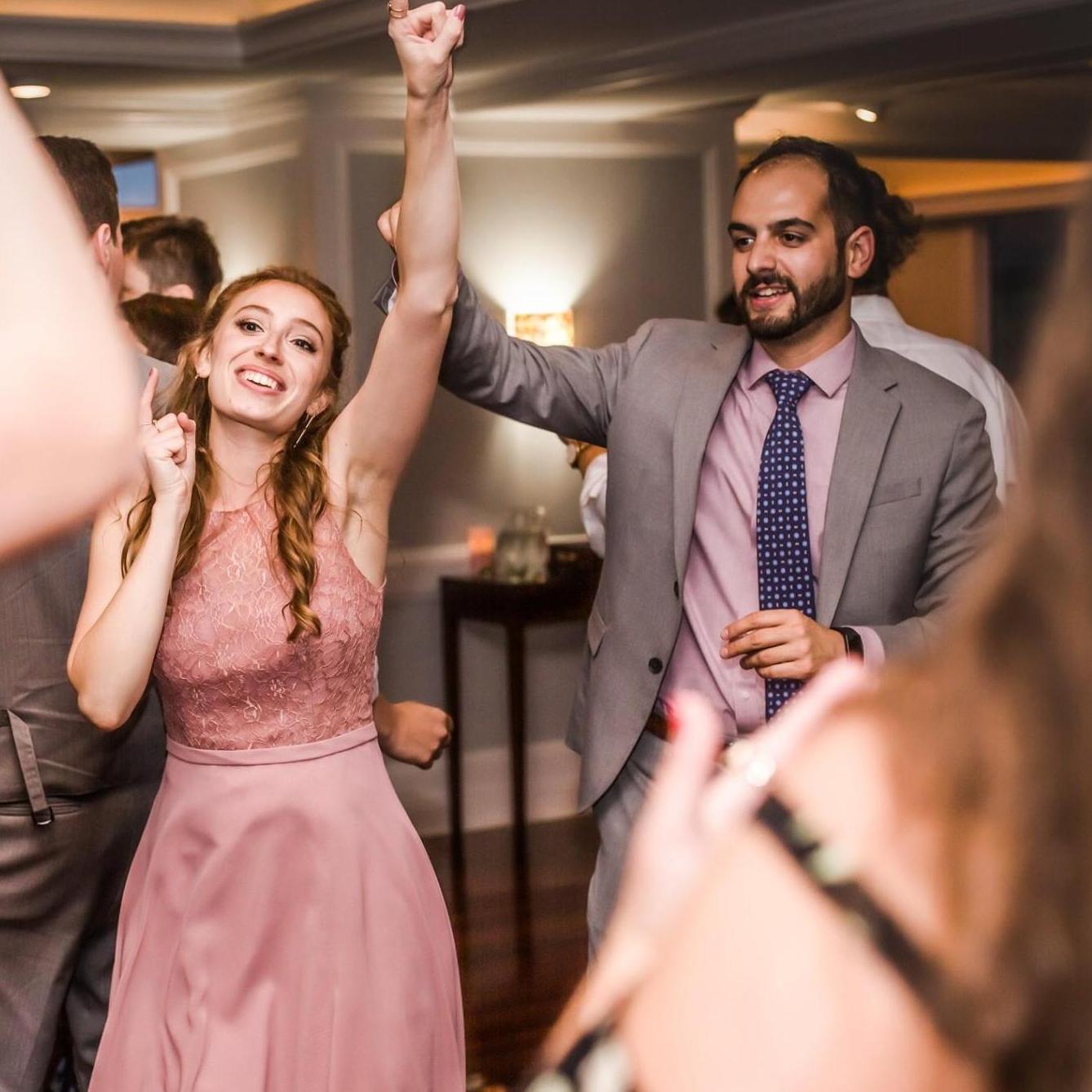 Carly dancing and Eddie trying to dance at Kevin and Larissa's wedding!