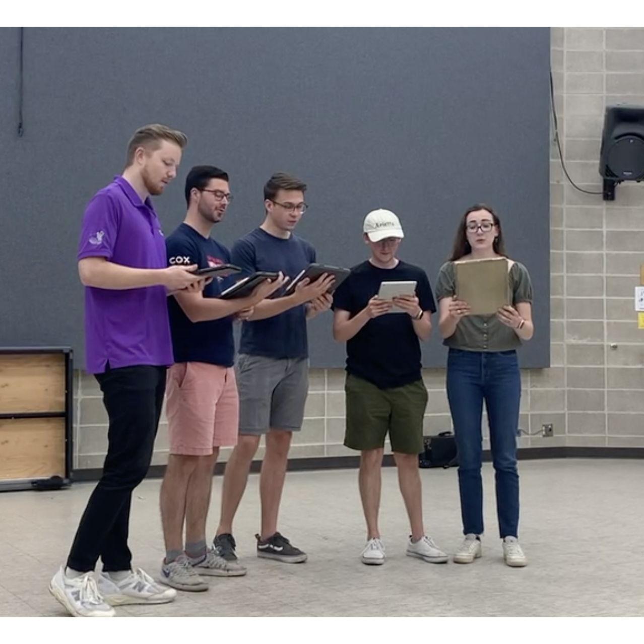 Singing Aaron's barbershop mashup of Leaving on a Jet Plane and Bye Bye Bye for the second year masters students' final studio class, (though Aaron graduated after them due to his time in NOLA)