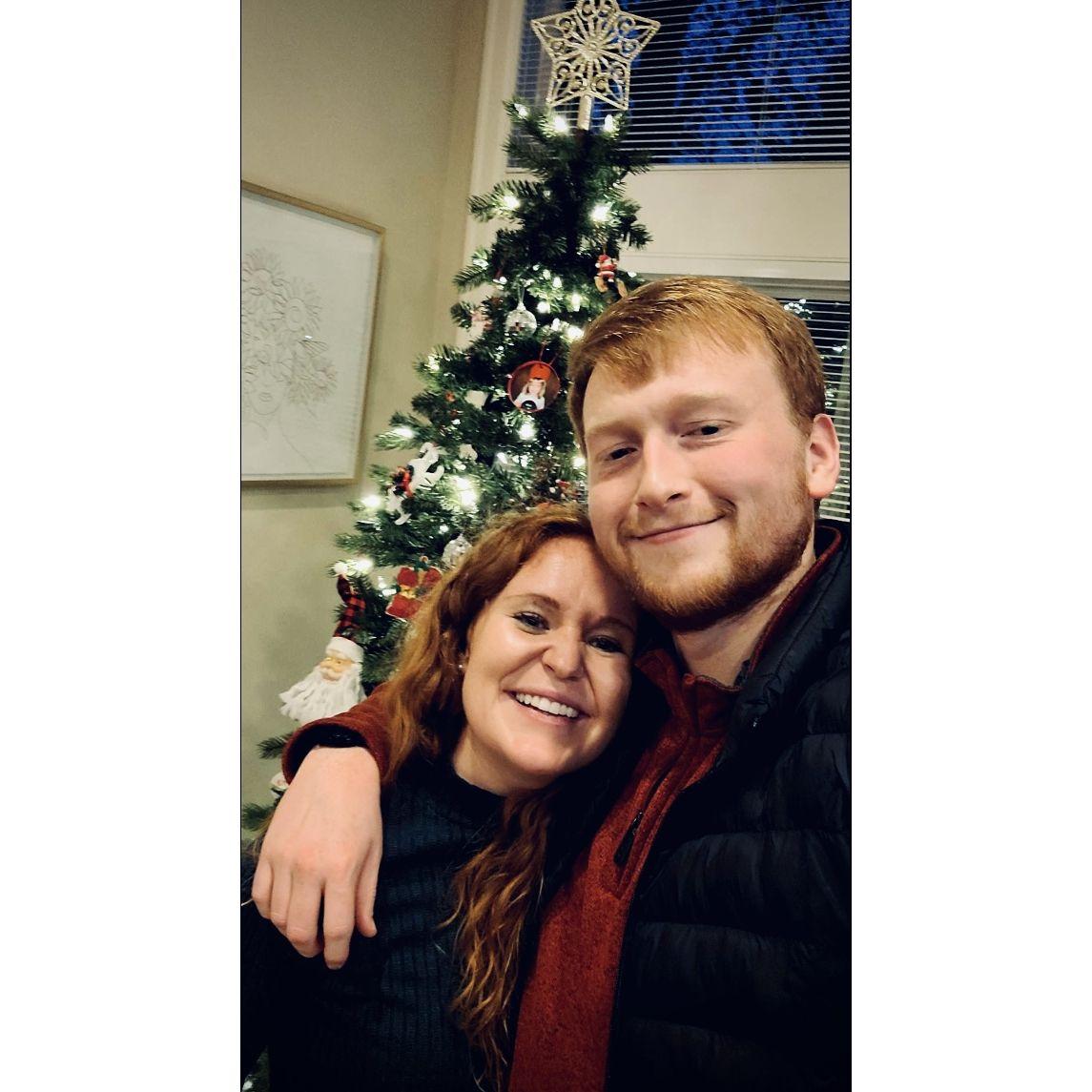 At a Christmas party in Seattle celebrating our first Christmas together with friends. December 2022. (Seattle, WA)