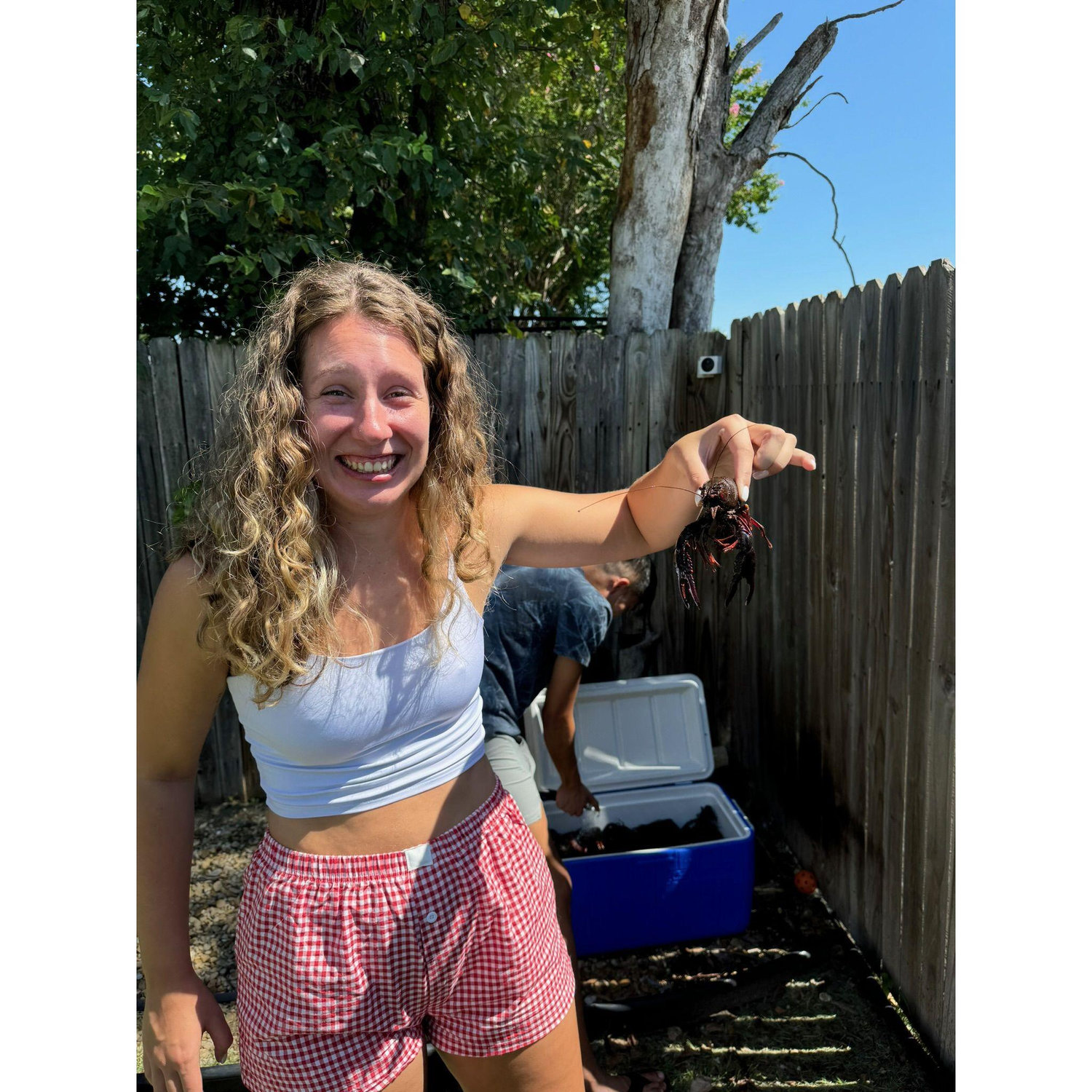 and Amanda is still terrfified of crawfish.. but hey! she did pick one up and smile (kinda)