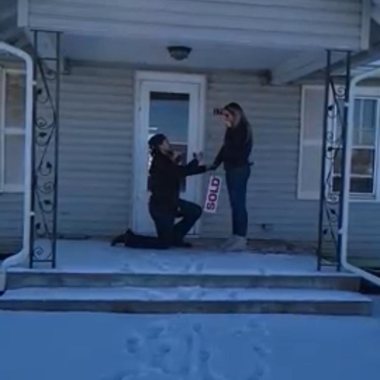 Crispen proposed on the front porch of our new house🥹