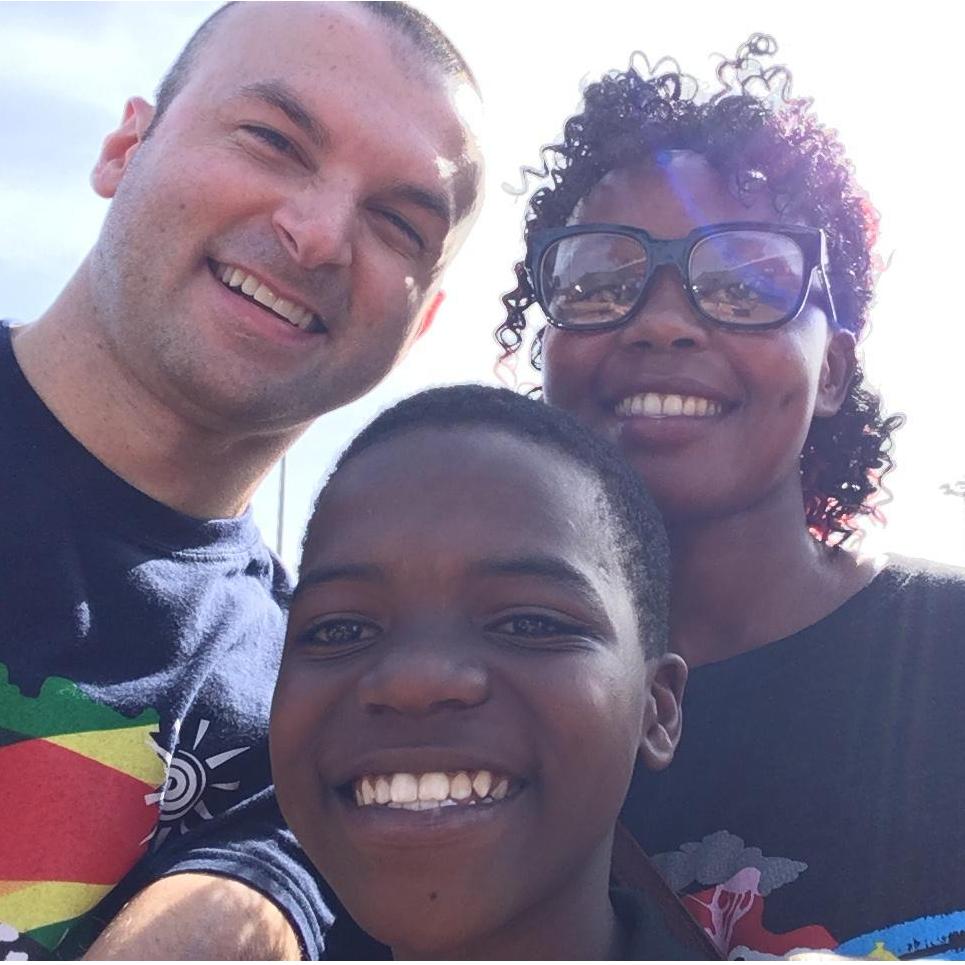 Eric and Kemi with John Lutaya upon Eric's arrival to Entebbe Airport in Uganda Nov 2018.