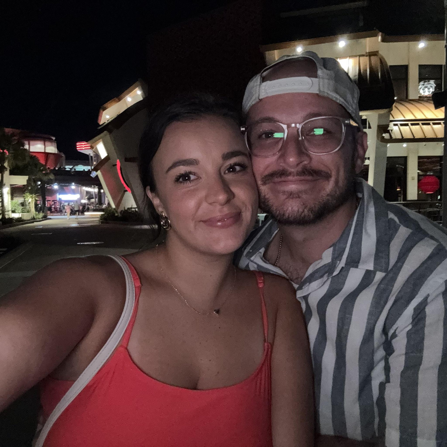 The night we got engaged! Right in front of a hot air balloon, next to the water, in Disney Springs. Just us two!