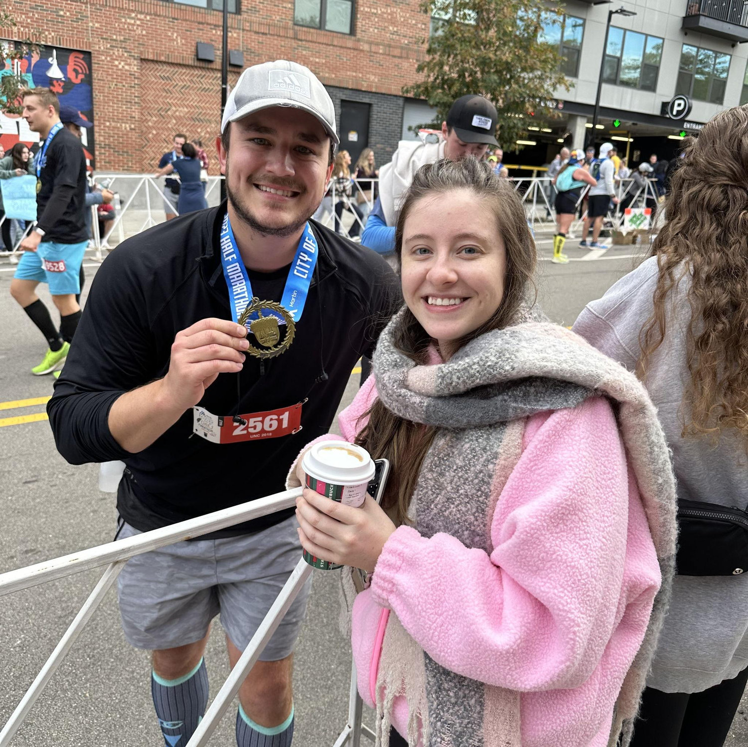 Tyler after running the City of Oaks half marathon. Standing out from the crowd in my PINK!