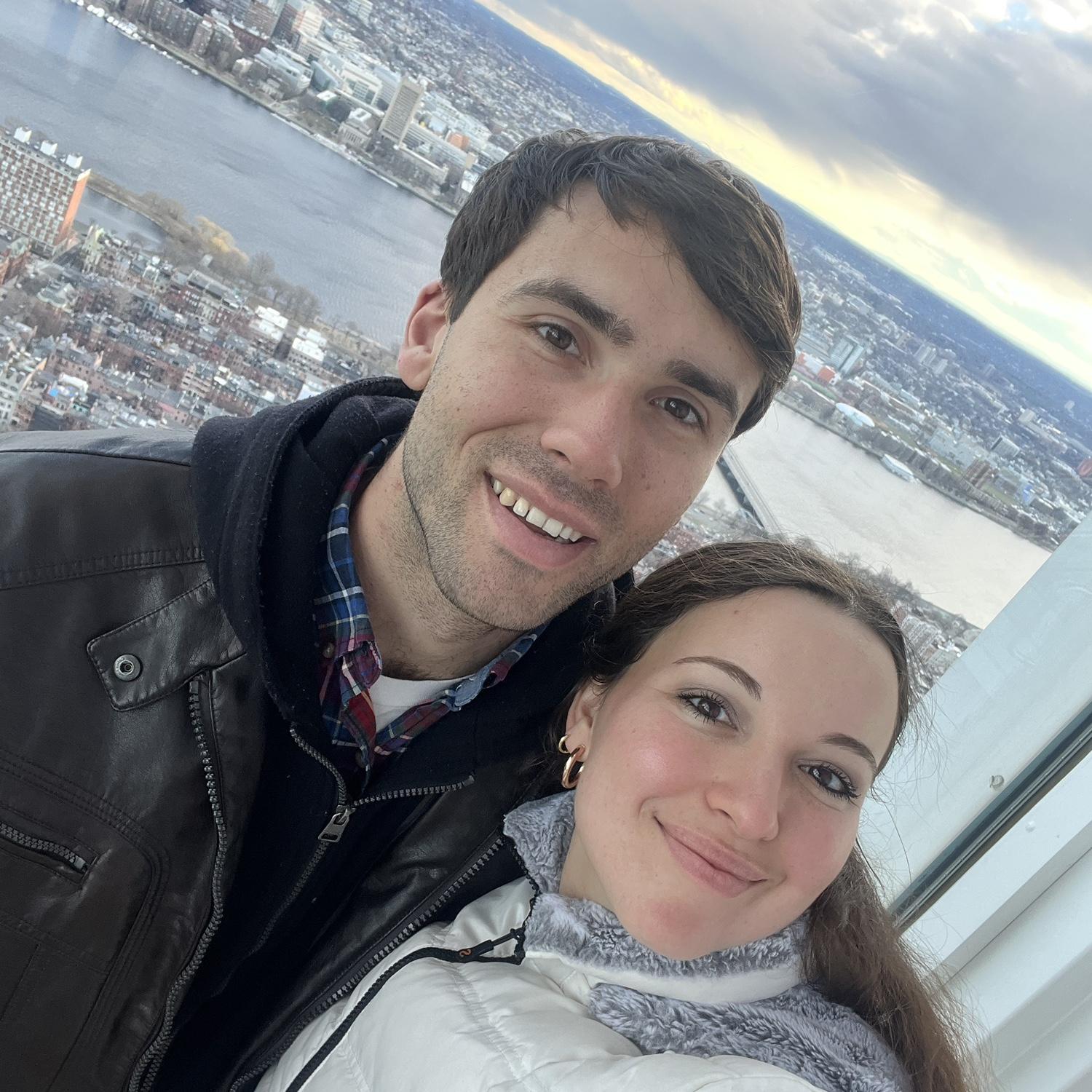 At the top of the Prudential center in Boston, one of our first dates!