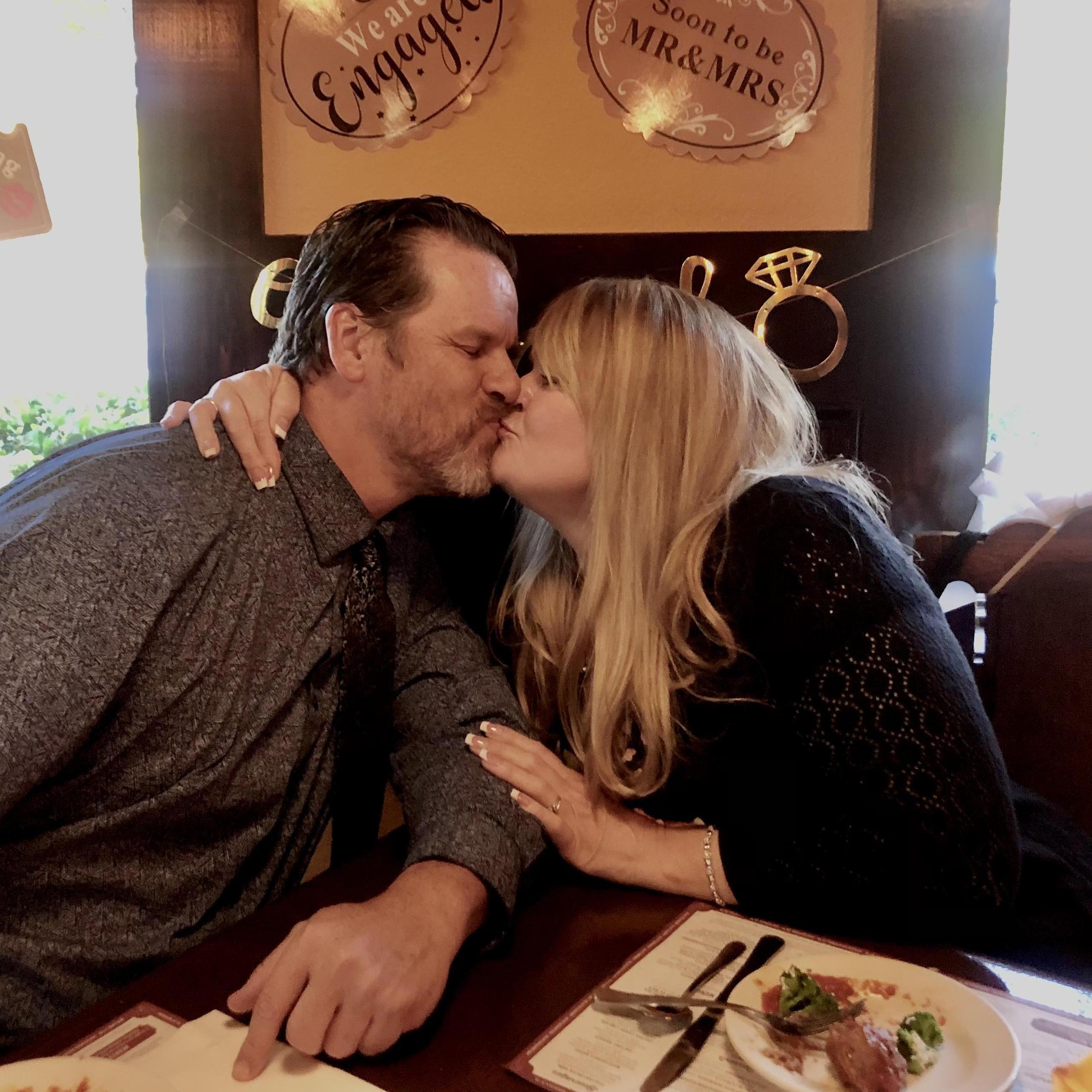 Kisses at our engagement dinner