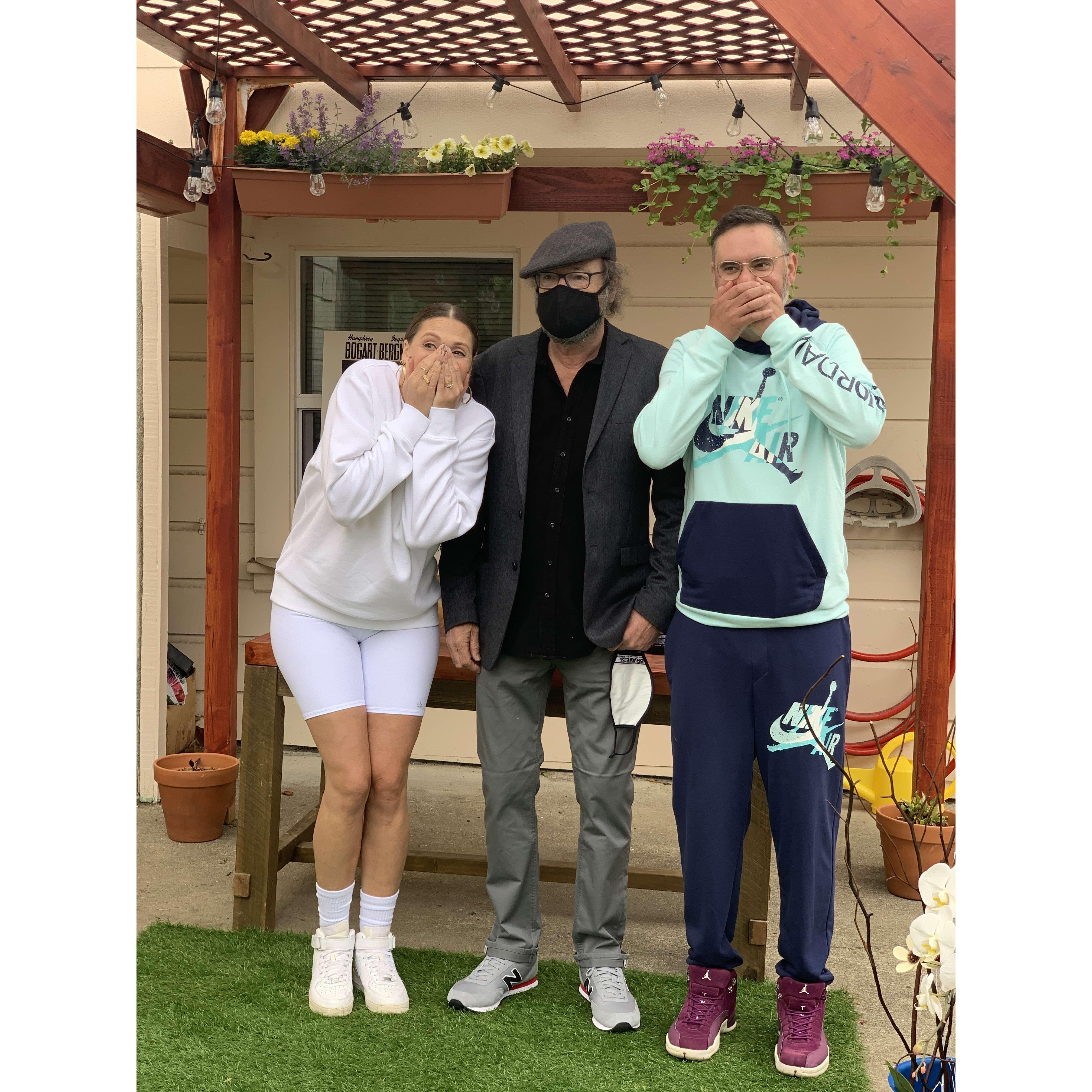 The newlyweds with Roger, Emily's dad.