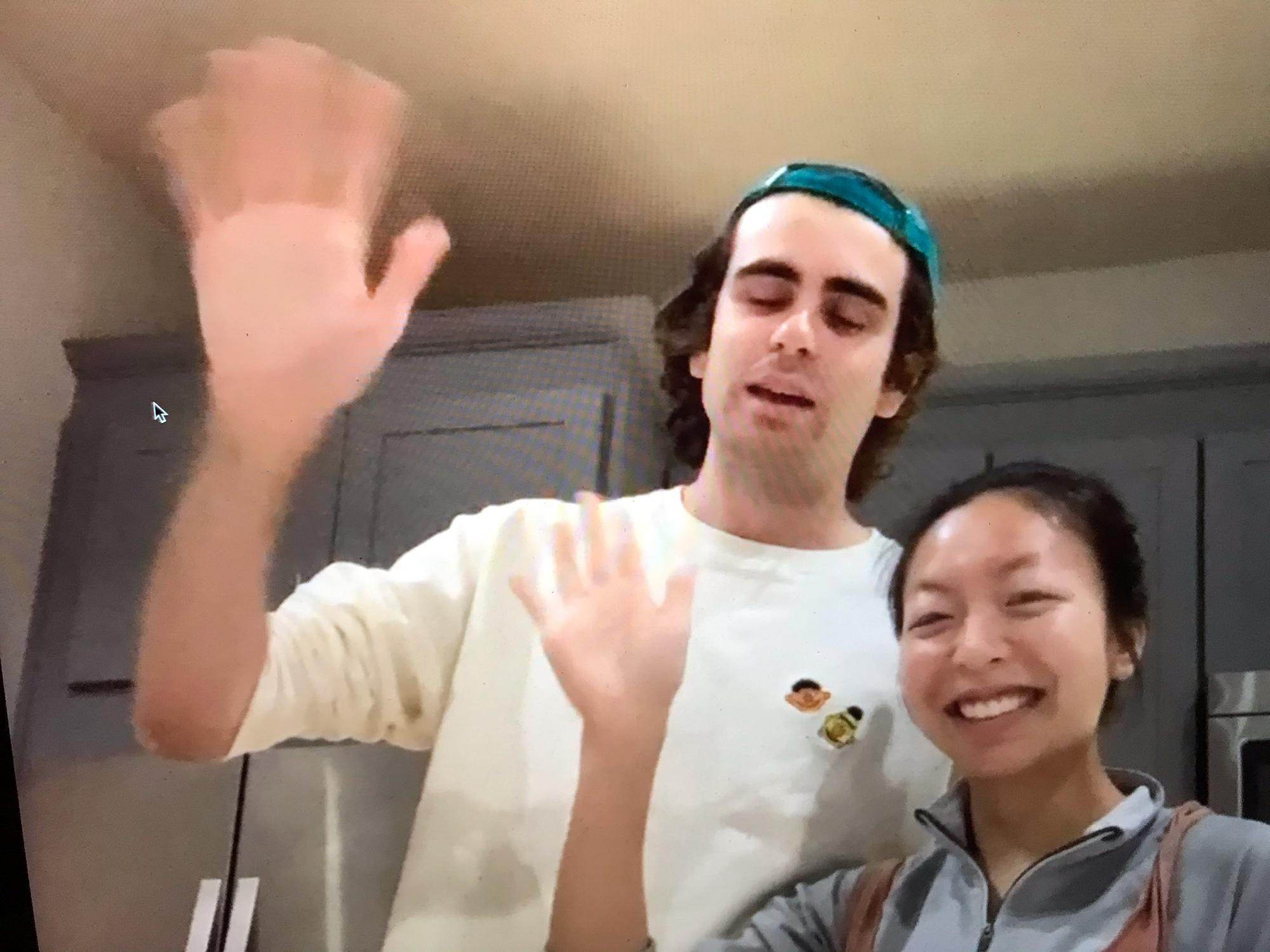 Thanksgiving 2020 - A very COVID Thanksgiving. FaceTiming Jake, our officiant, while he teaches Megan how to make an apple pie! We don’t know why Johns hand looks like a baseball mitt.
