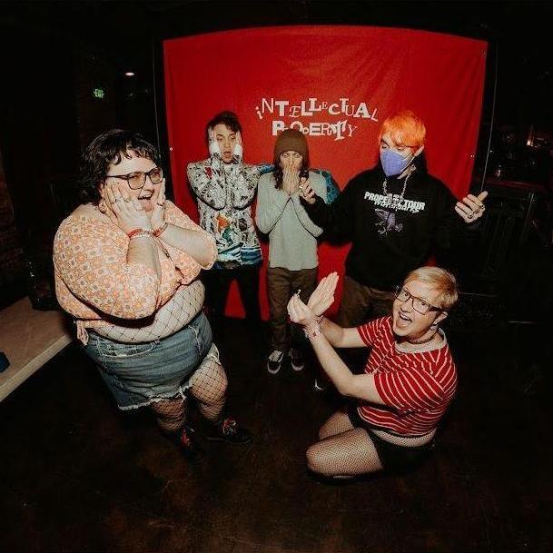 The photo op with Awsten, Geoff, and Otto from the Waterparks concert on May 5, 2023.