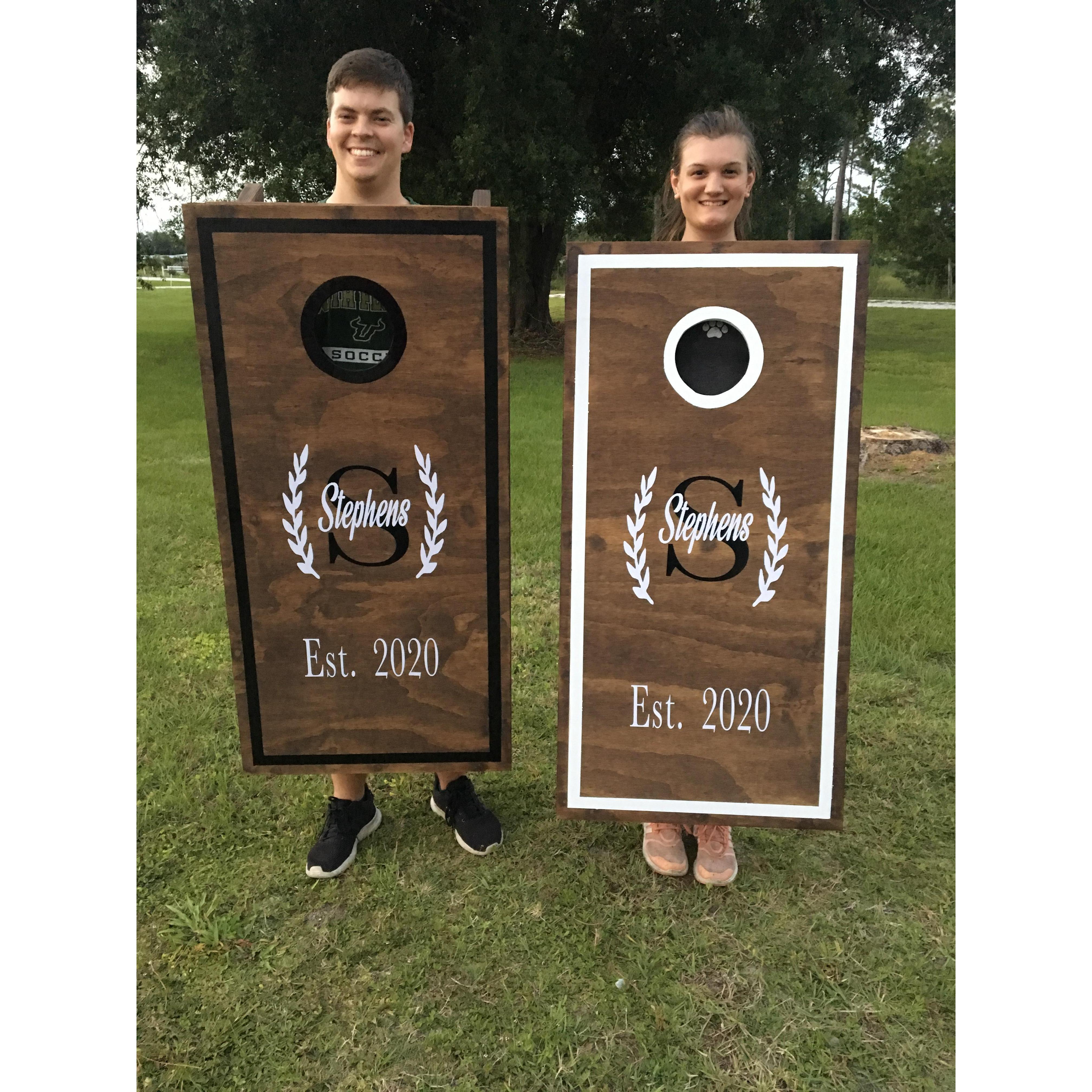 We announced our engagement to Charlie’s uncle, aunt and cousin by decorating corn-hole boards they helped us make.