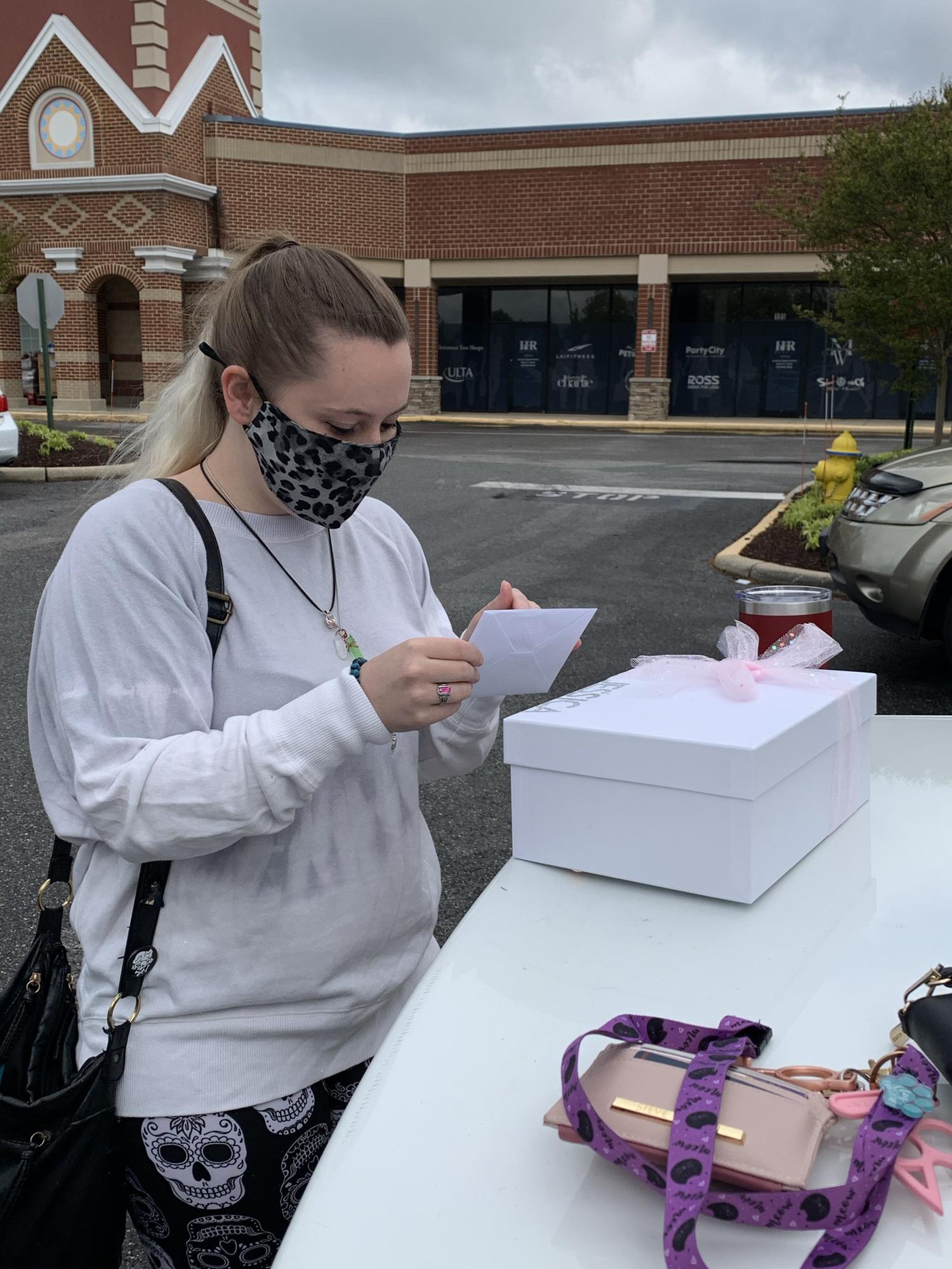 Jessica opening her bridesmaid proposal box