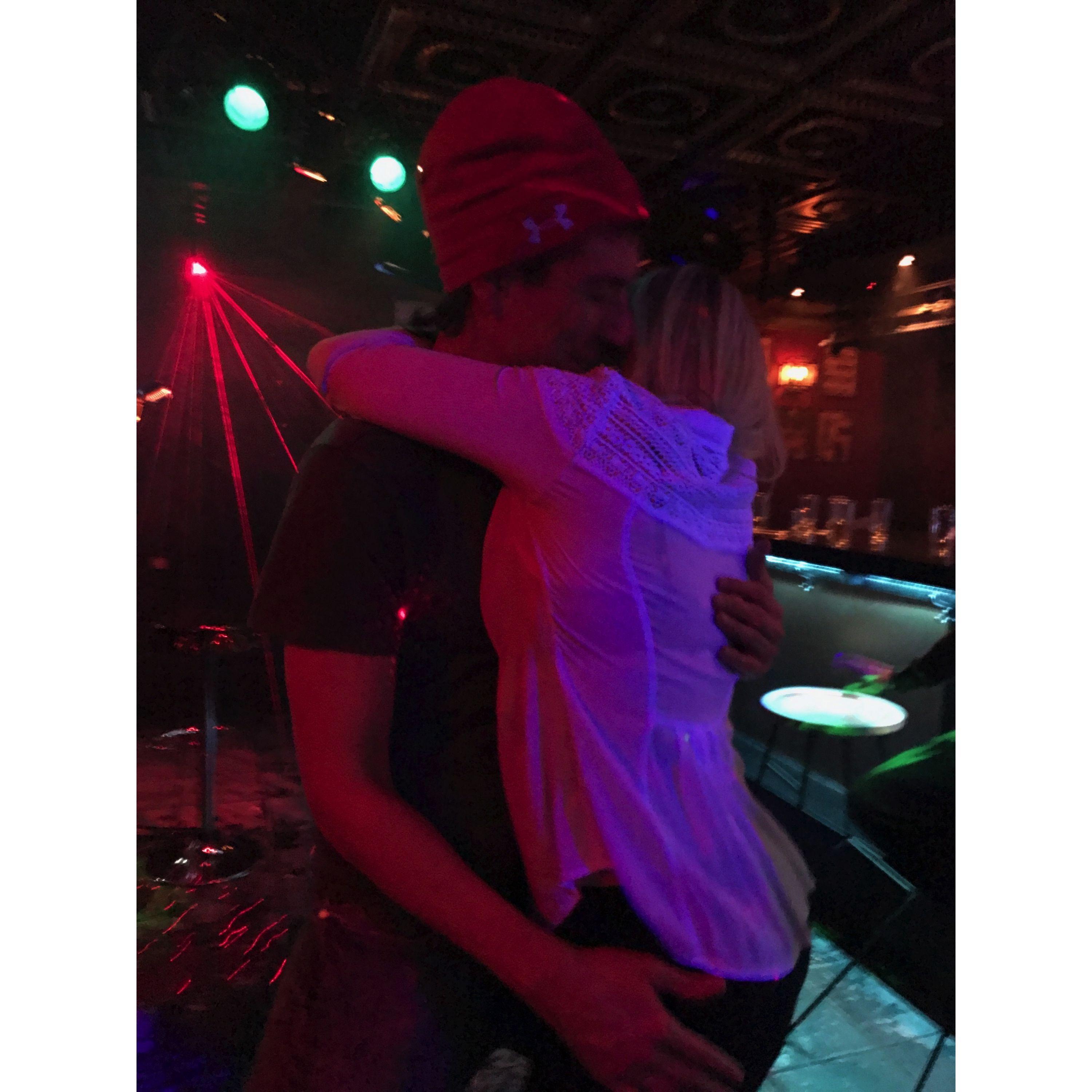 Alex and Jason share a hug at one of their first karaokes.