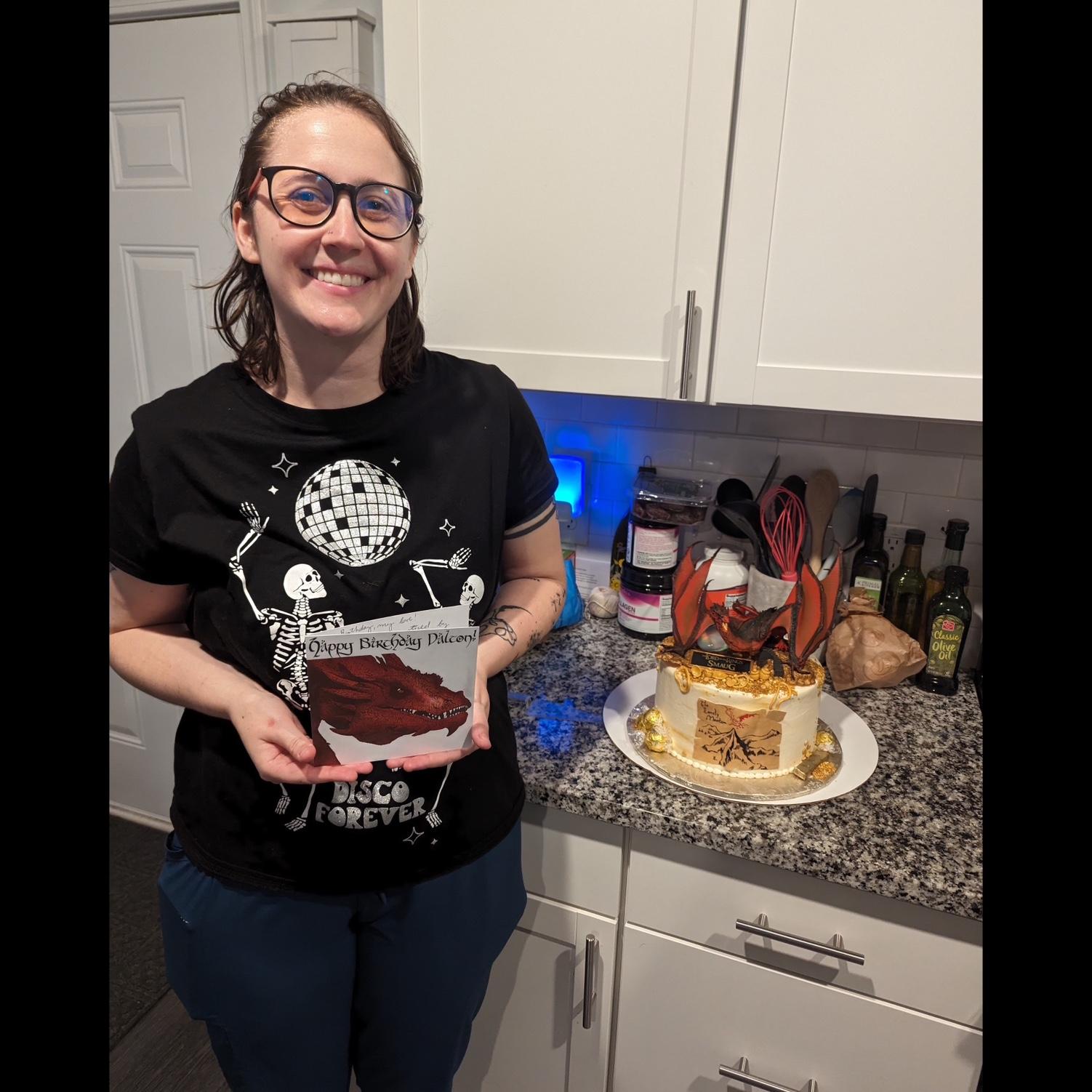 Krista posing with Dalton’s Smaug-themed (The Hobbit) 26th birthday cake