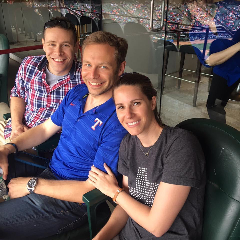 Ranger Game with Kevin's twin brother, Travis, and his mom, Janet, photobombing.