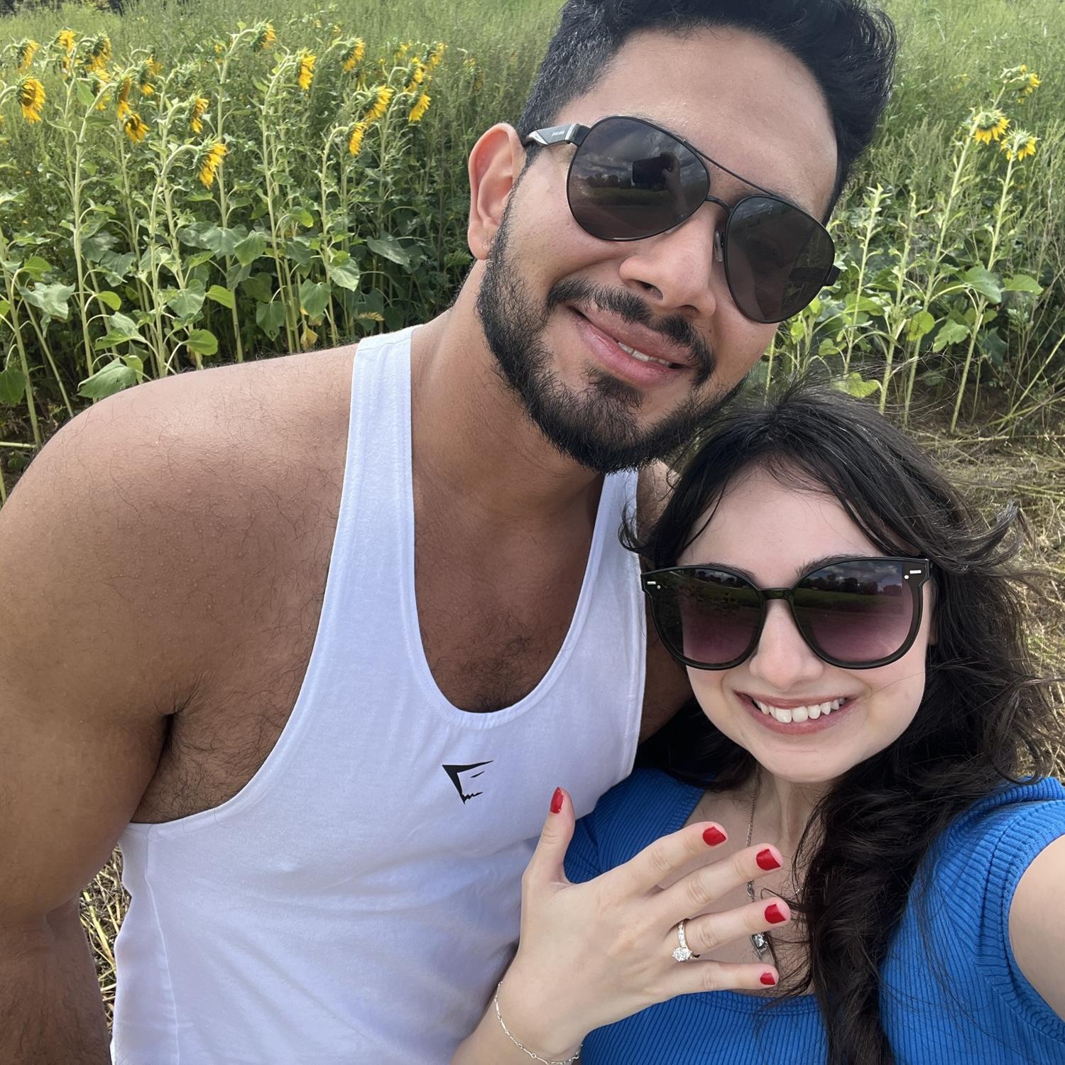 The day after Baher proposed, we walked around the sunflower gardens at St. Luke’s (where we met)!