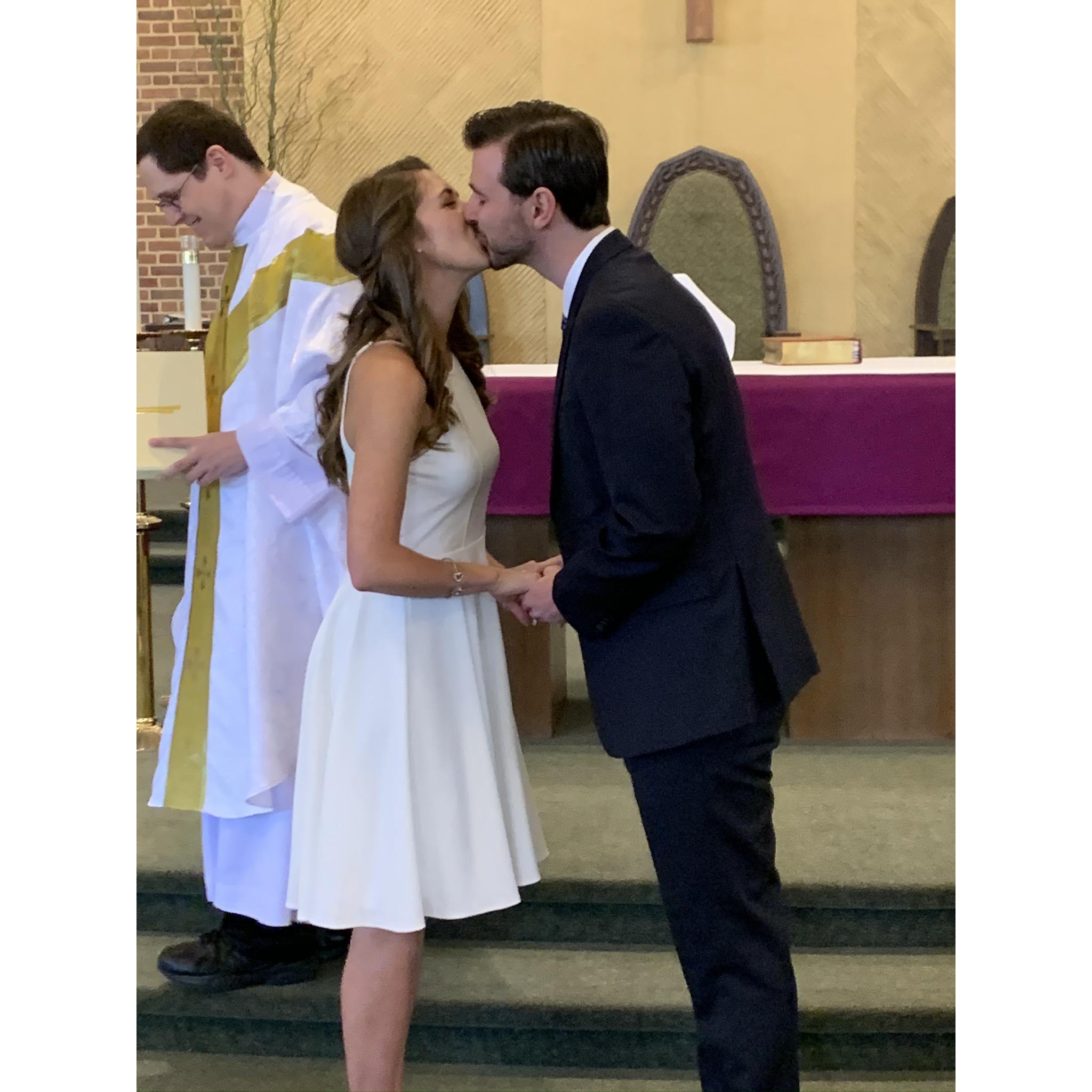 First kiss as husband and wife!