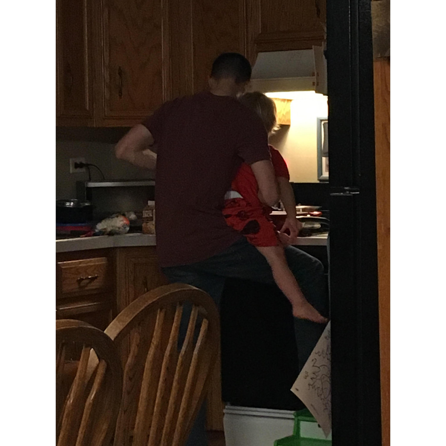 Our chef-to-be Ean cooking with the conscientious instructions of Kevin