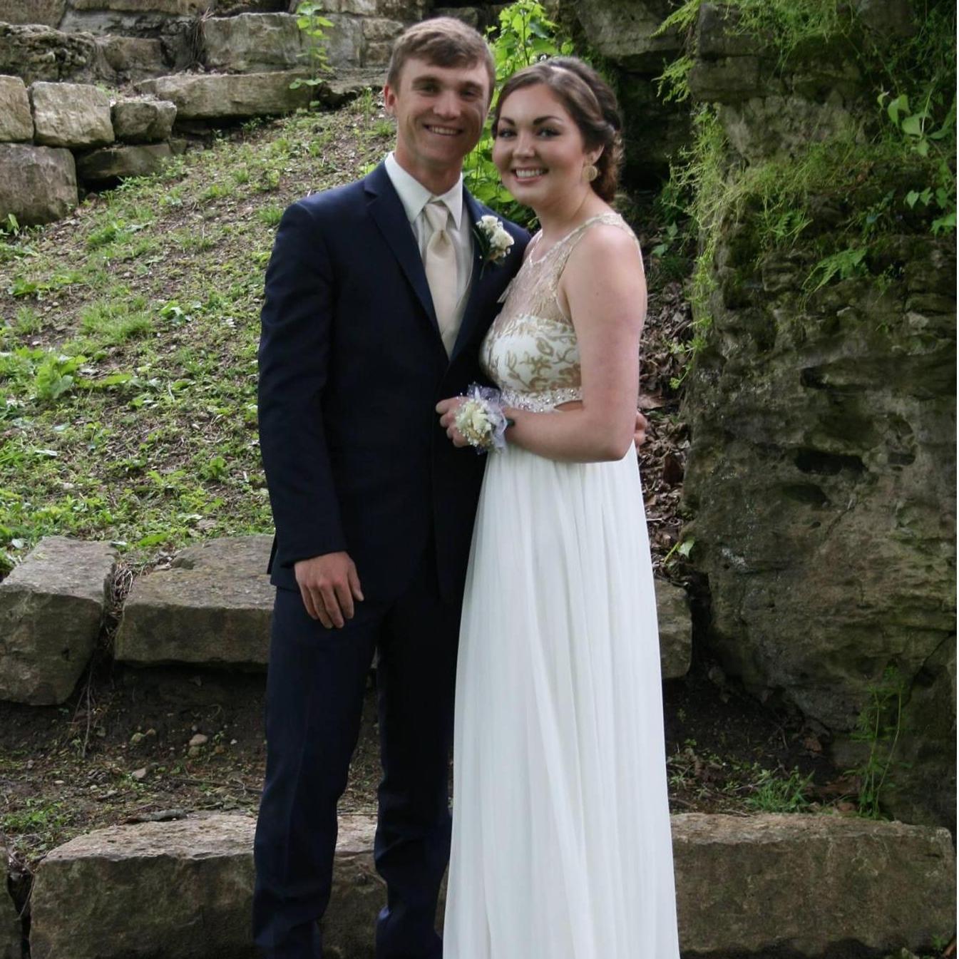 Gabe's senior prom. People thought they were taking wedding pictures... look where they are now! -May 2017