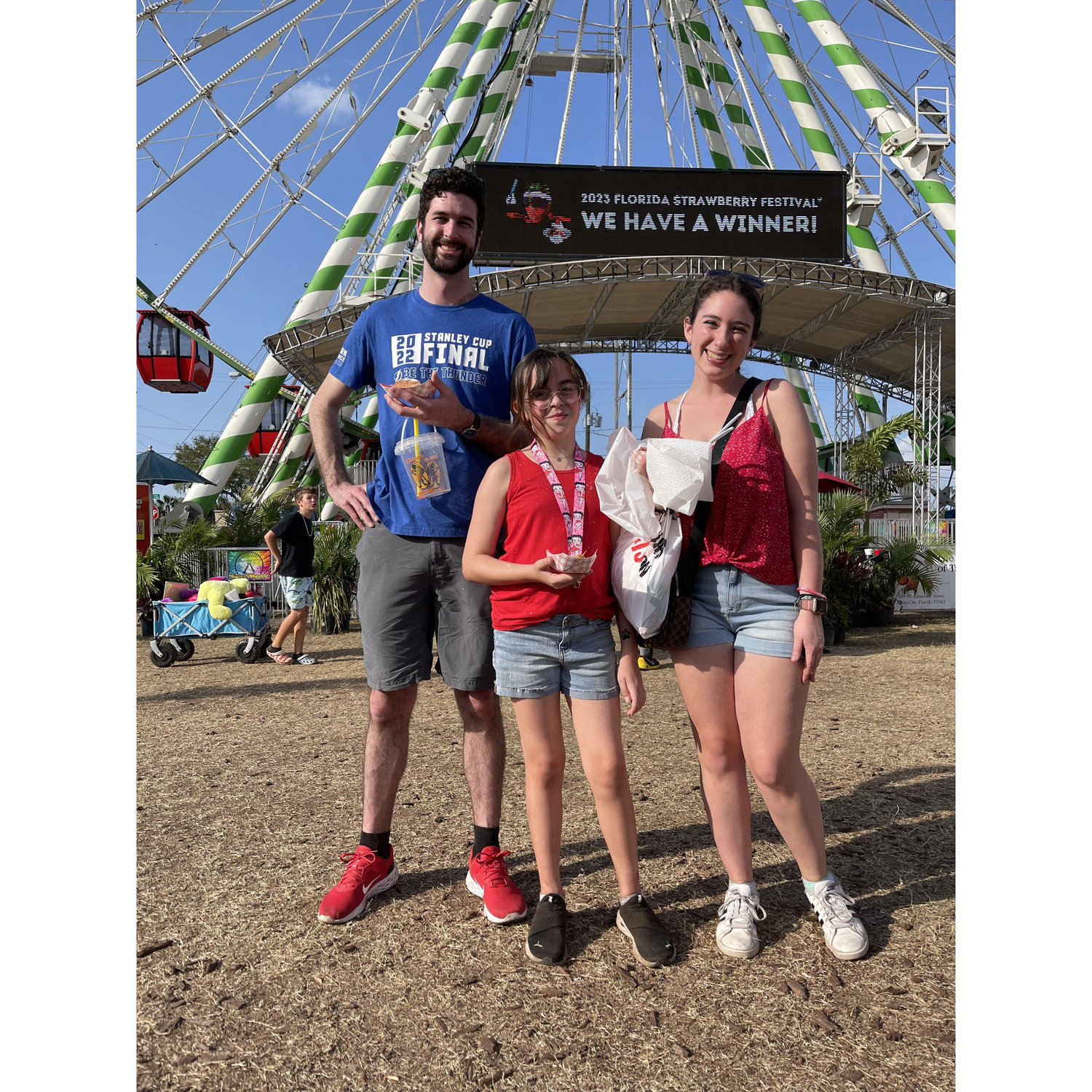 Enjoying the strawberry festival with tiny roommate