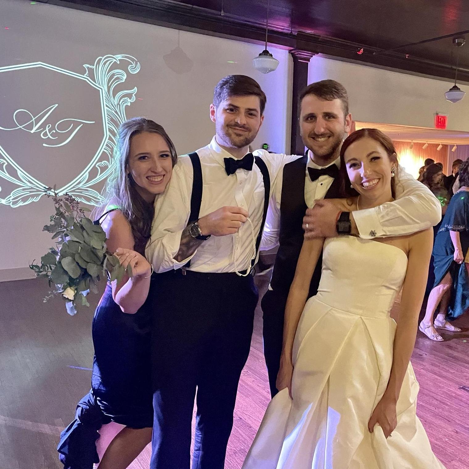 At one of our last weddings before getting engaged, Carrie caught the bouquet and Tyler caught the garter! (Little did she know at the time it was all planned...)
7/2021