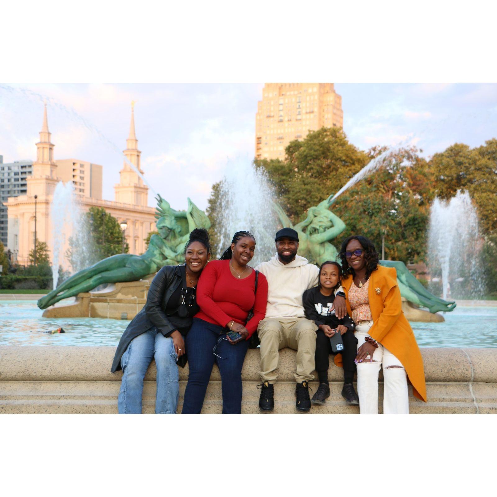 Golden hour in Philly with the ones who matter most 🌇💛 Laughing, relaxing, and making memories by the fountain. 

#FamilyTime #PhiladelphiaViews #GratefulHearts
