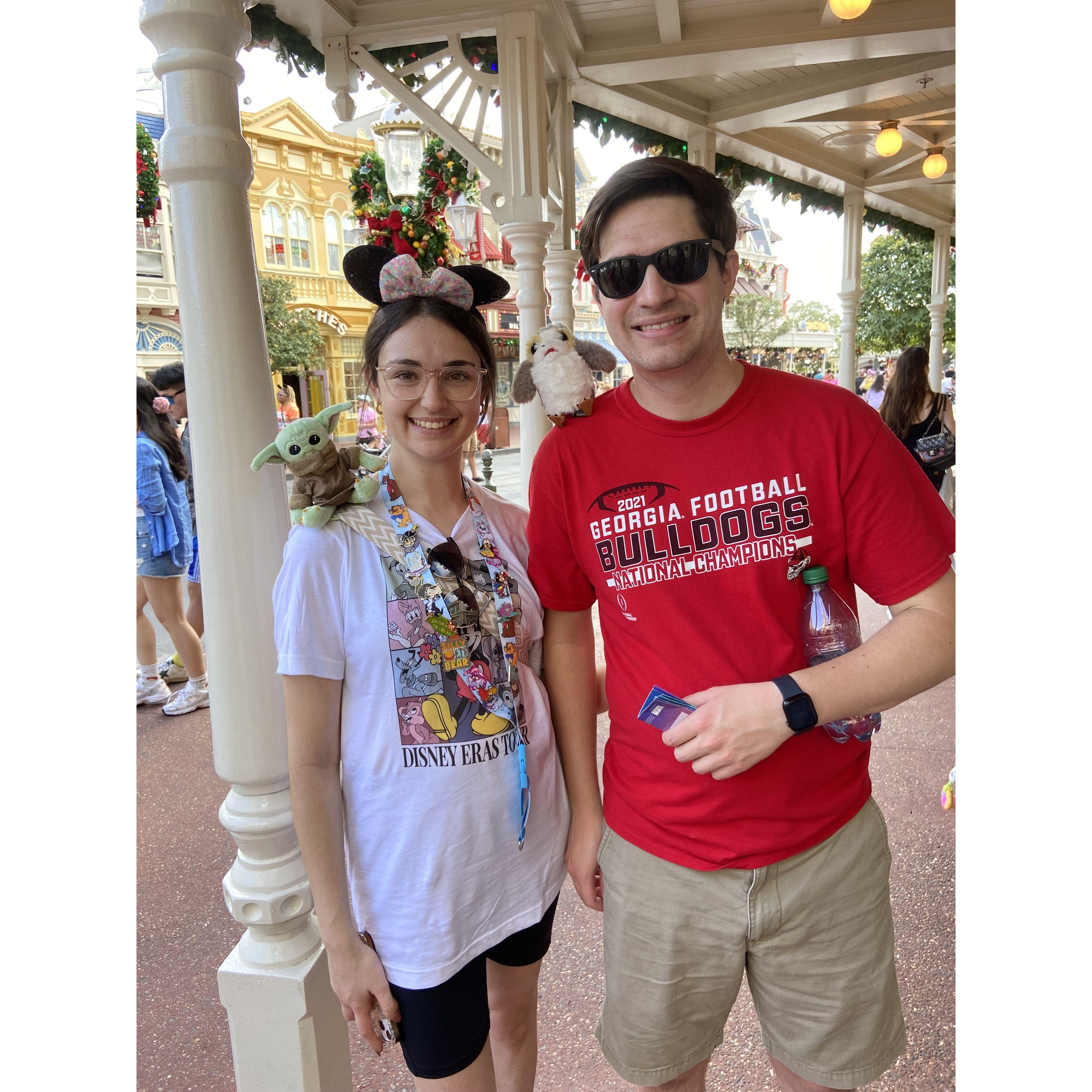 Ashley and Adam with their shoulder pets at Disney World