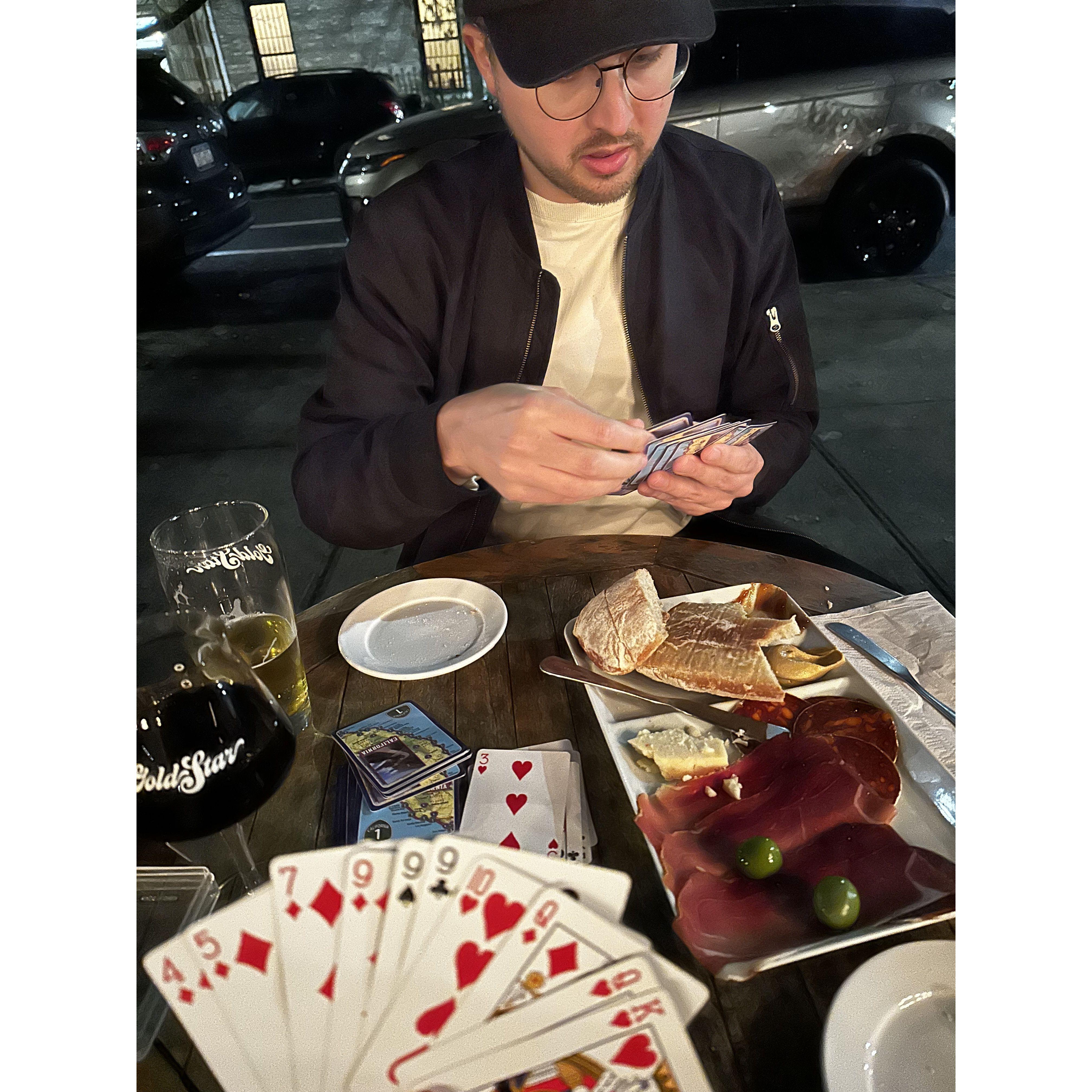 So many nights spent at our neighborhood beer counter with a charcuterie board playing cards. Ask us who is winning our all-time tally of Gin Rummy :)