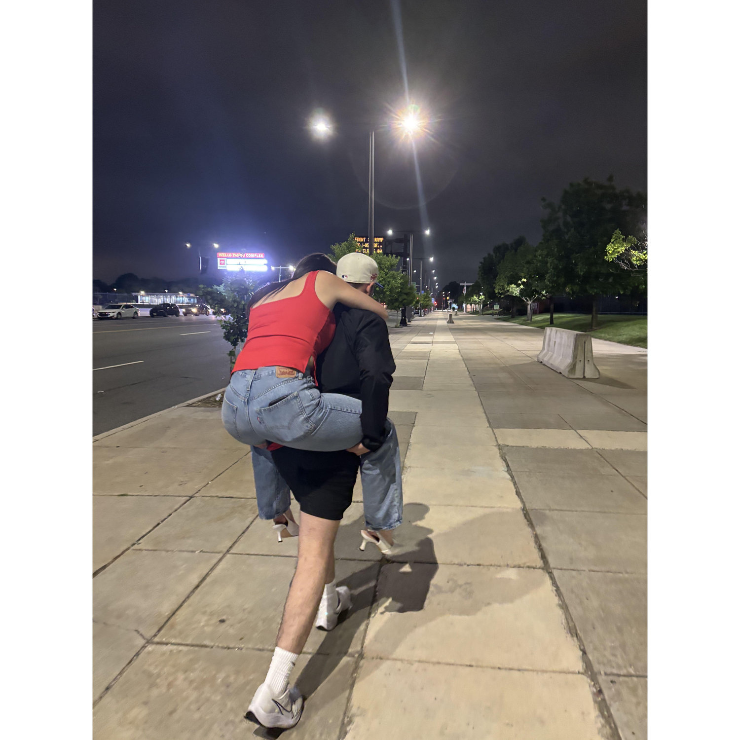 Mike carrying Cassidy after a Phillies game when she wore heels for some reason.