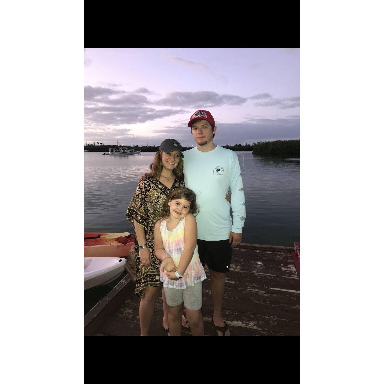 Family pic in Pensacola featuring Olivia, our junior bridesmaid!