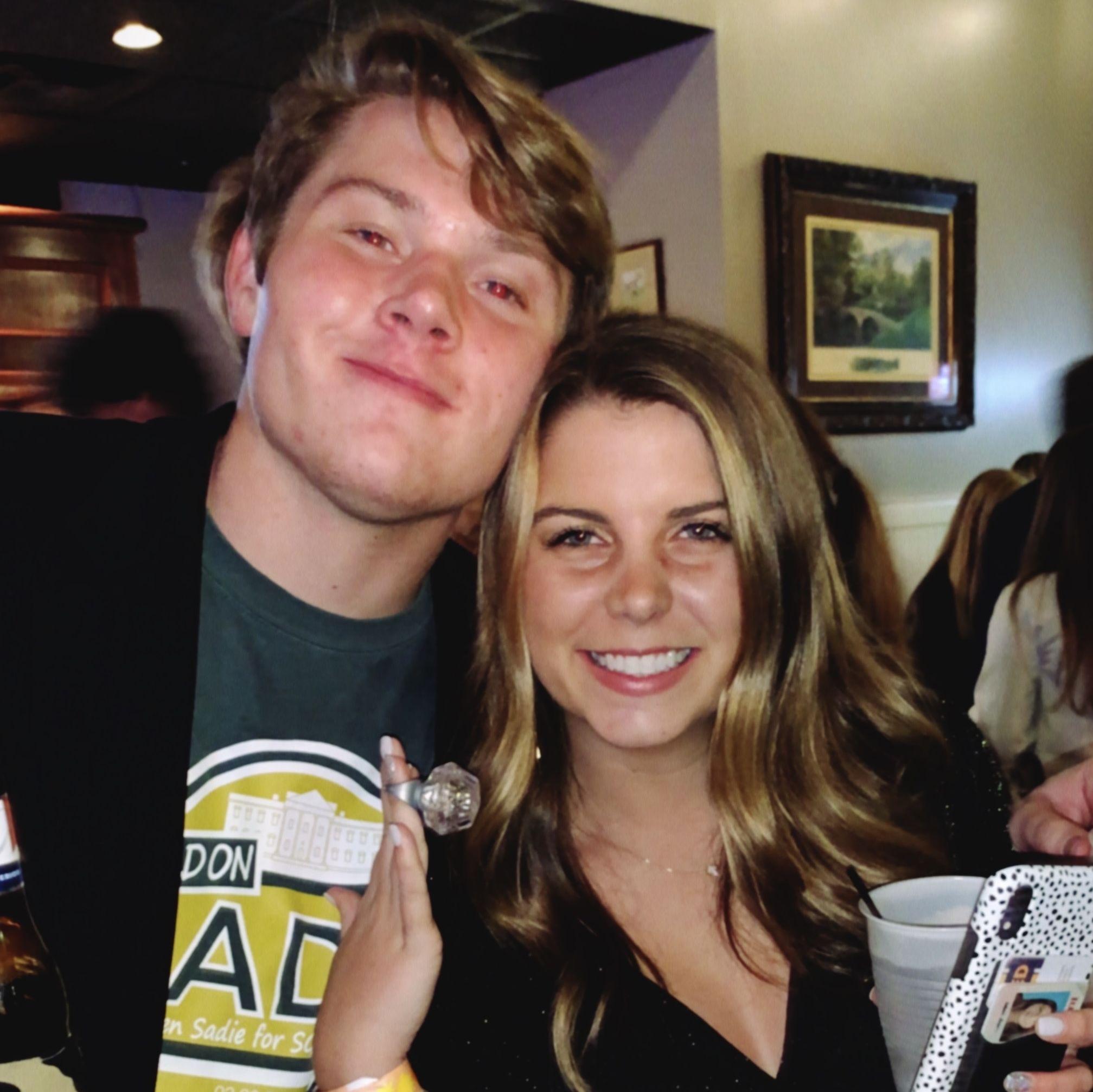 The first date party we ever went to together our Sophomore year of college. Josh jokingly "proposed" to me with a ring pop. Makes for a really great picture now!